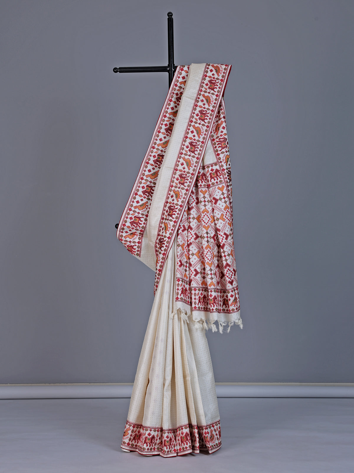 Off white tusser silk saree with heritage elephant zari motifs