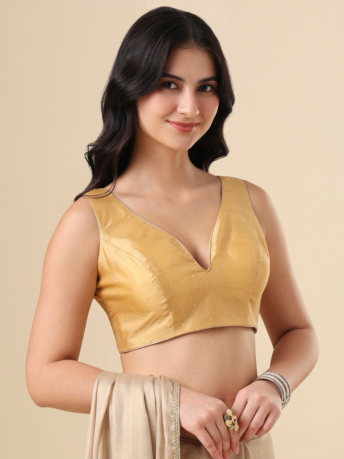 Gold taffeta silk zari woven blouse with elegant sleeveless style