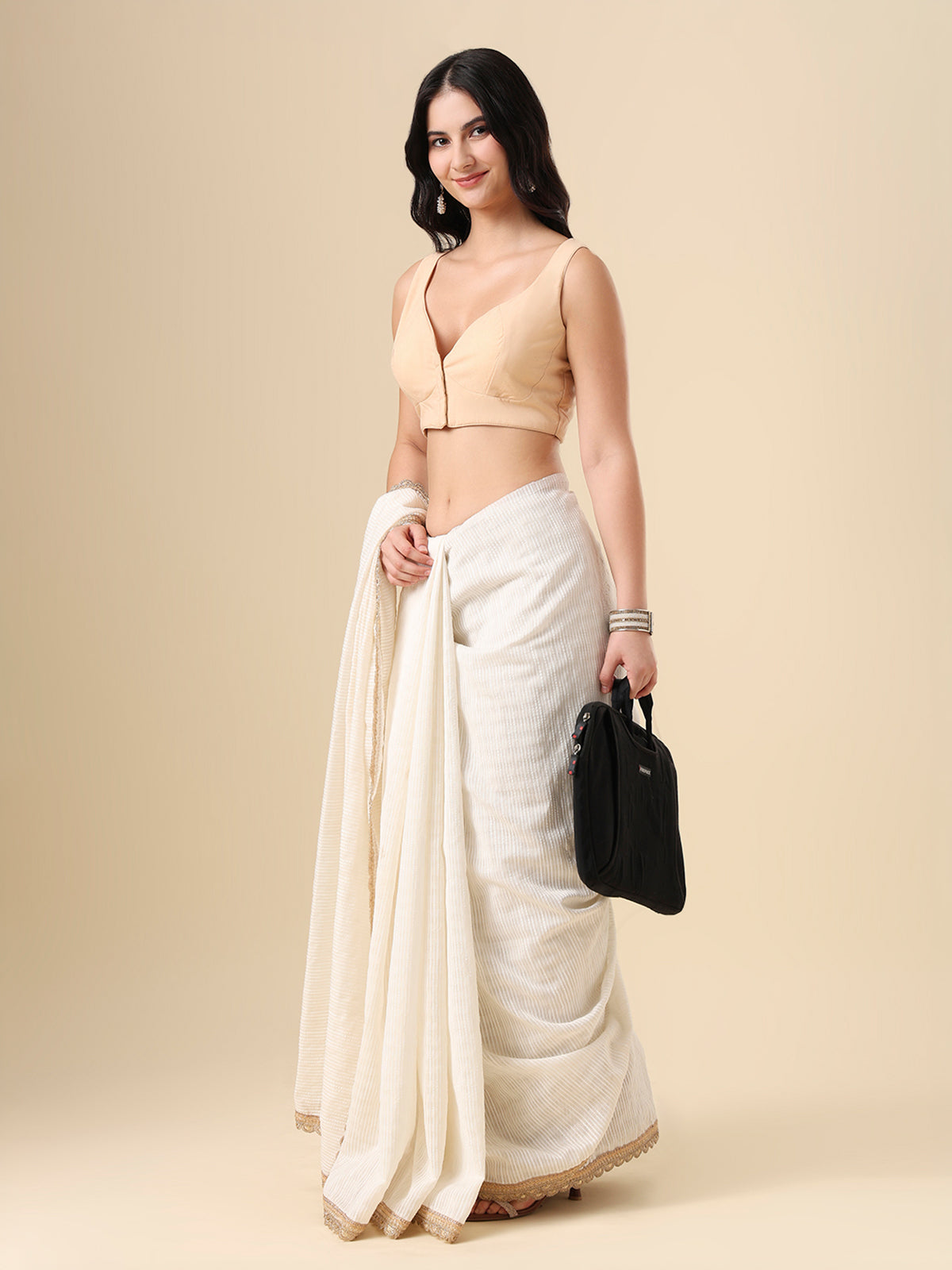 Beige cotton solid blouse with front open sleeveless design