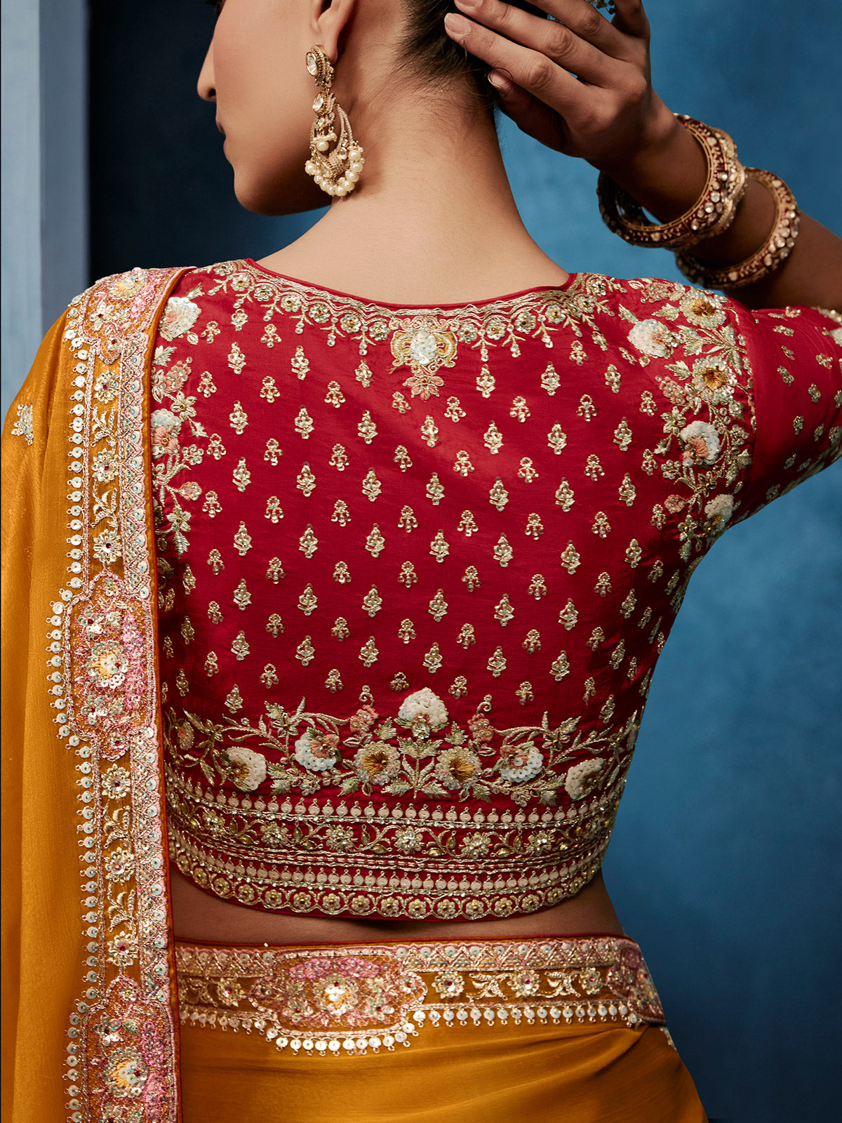 Mustard yellow tissue silk saree for wedding celebrations