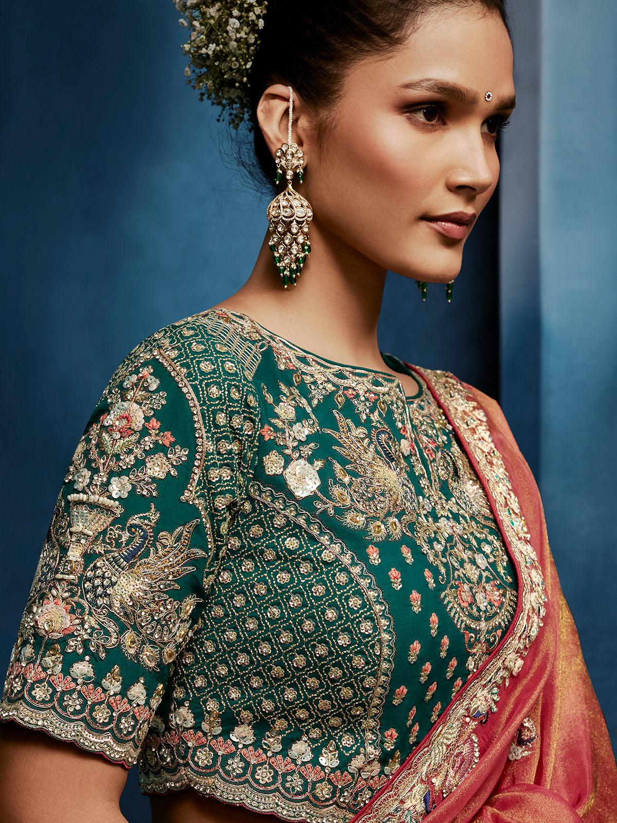 Peach tissue silk saree with intricate heavy work