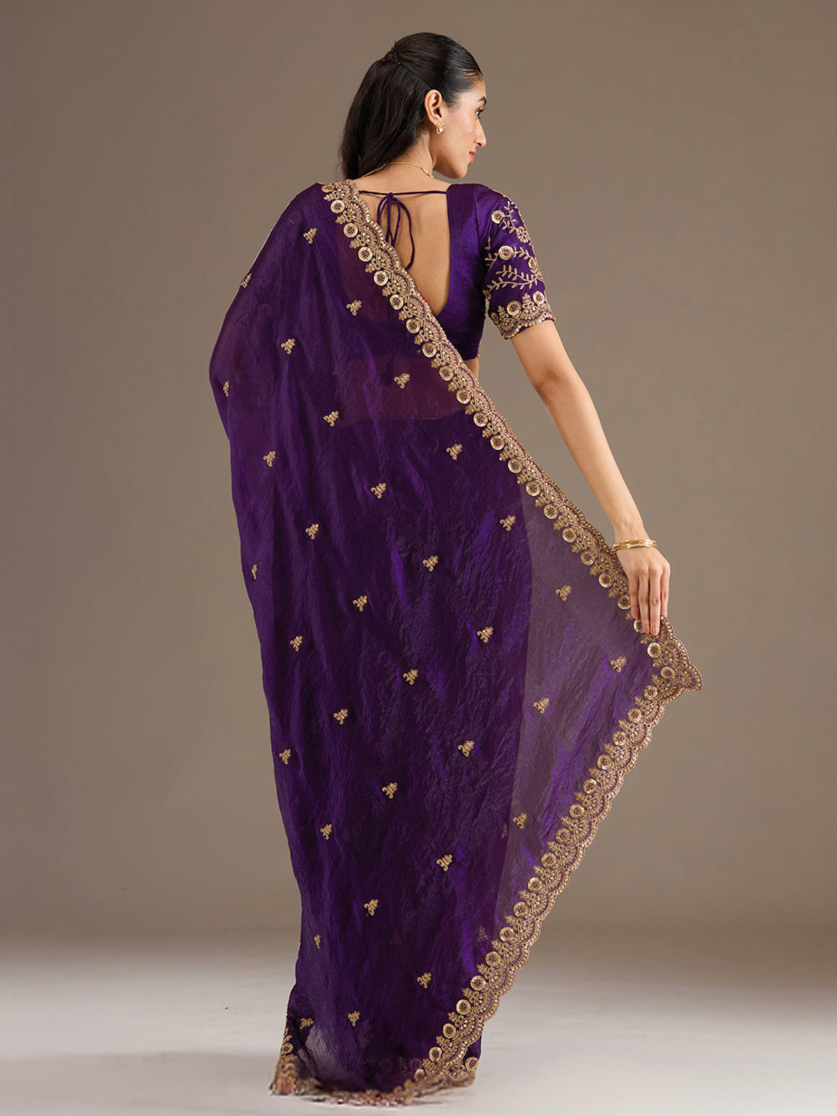 Purple tissue saree for party celebration