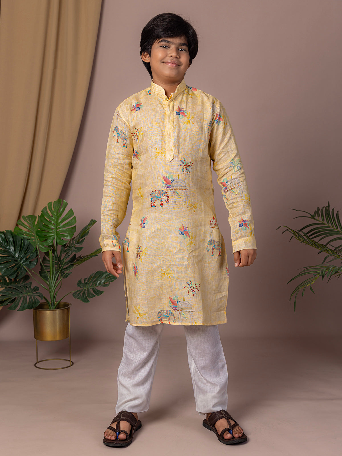 Light yellow kurta suit with thread work print