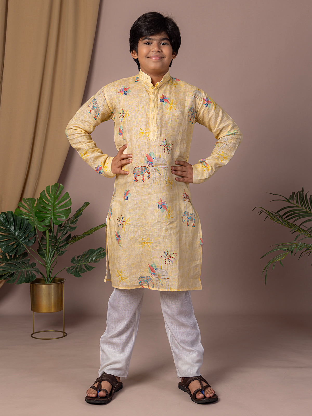 Light yellow kurta suit with thread work print