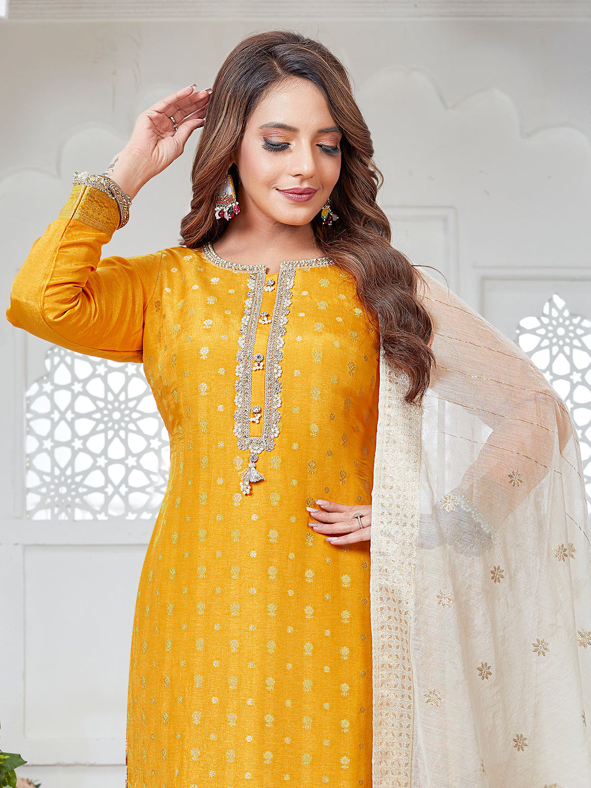 Mustard yellow silk straight cut suit with pearl work