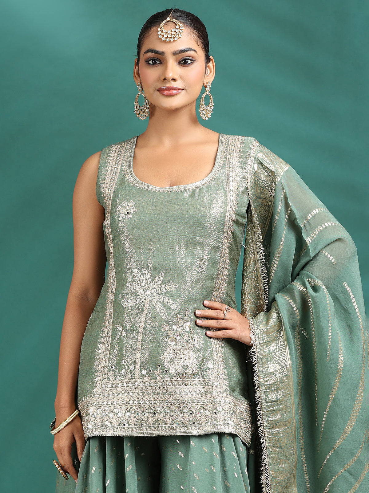 Graceful sage green sharara set with detailed work