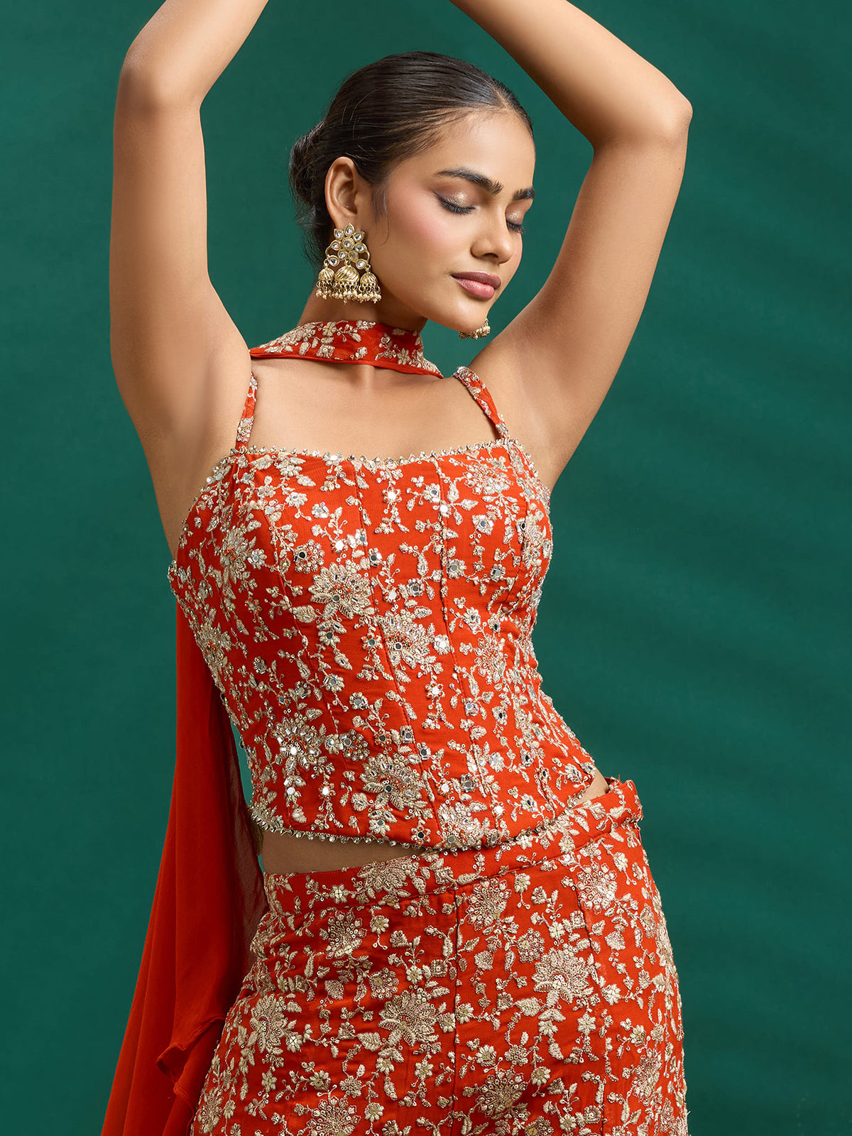 Rich rust orange palazzo set with intricate embroidery