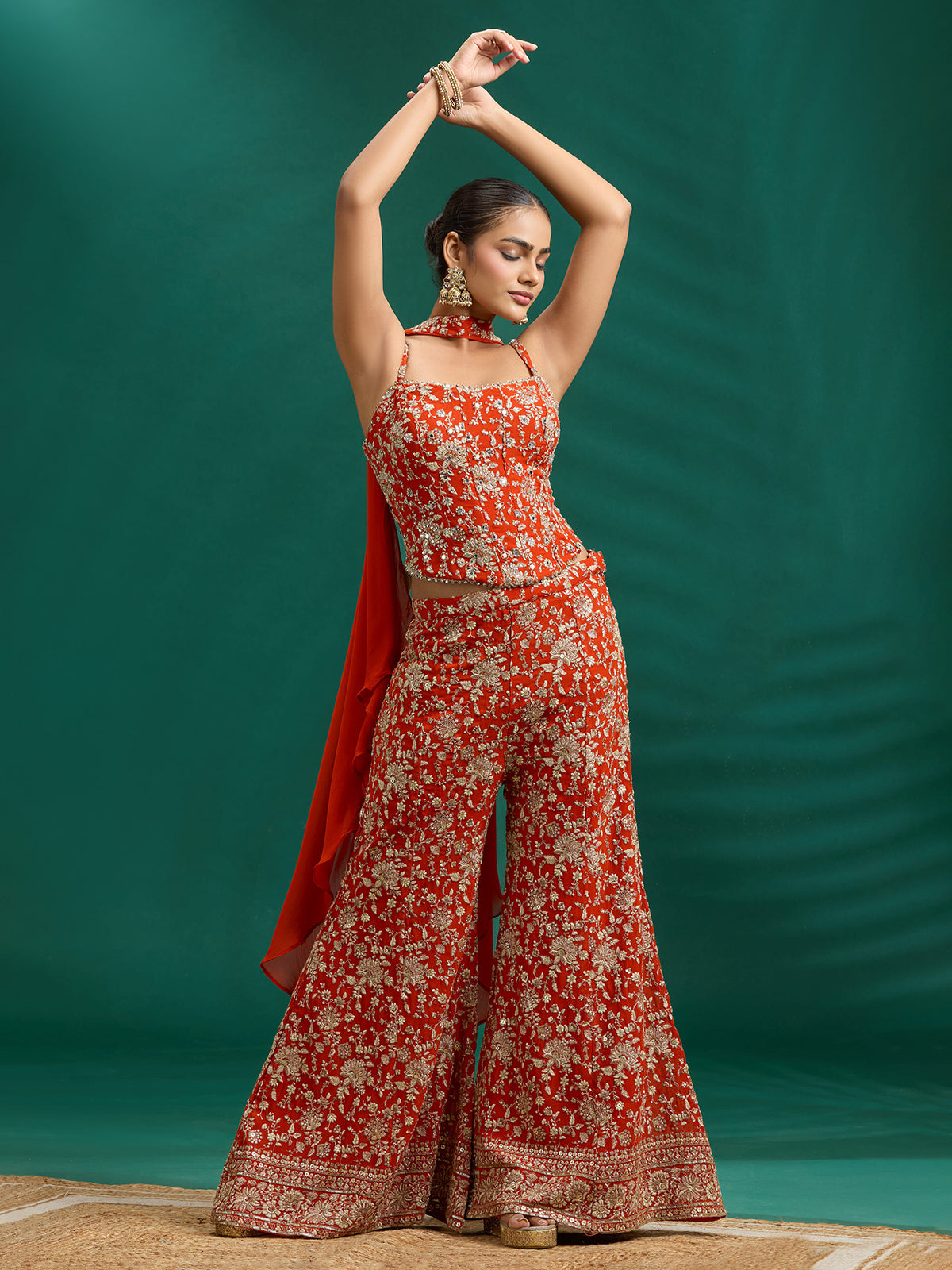 Rich rust orange palazzo set with intricate embroidery