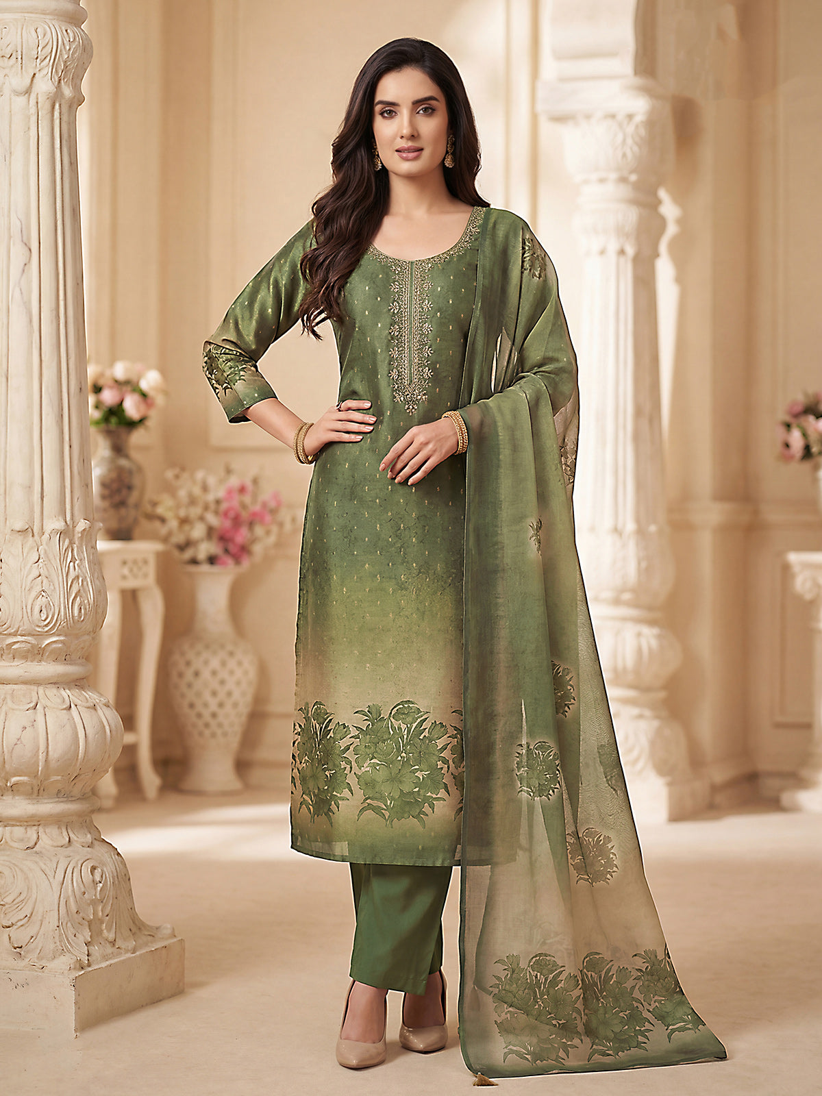 Green silk straight cut salwar suit with festive embellishments