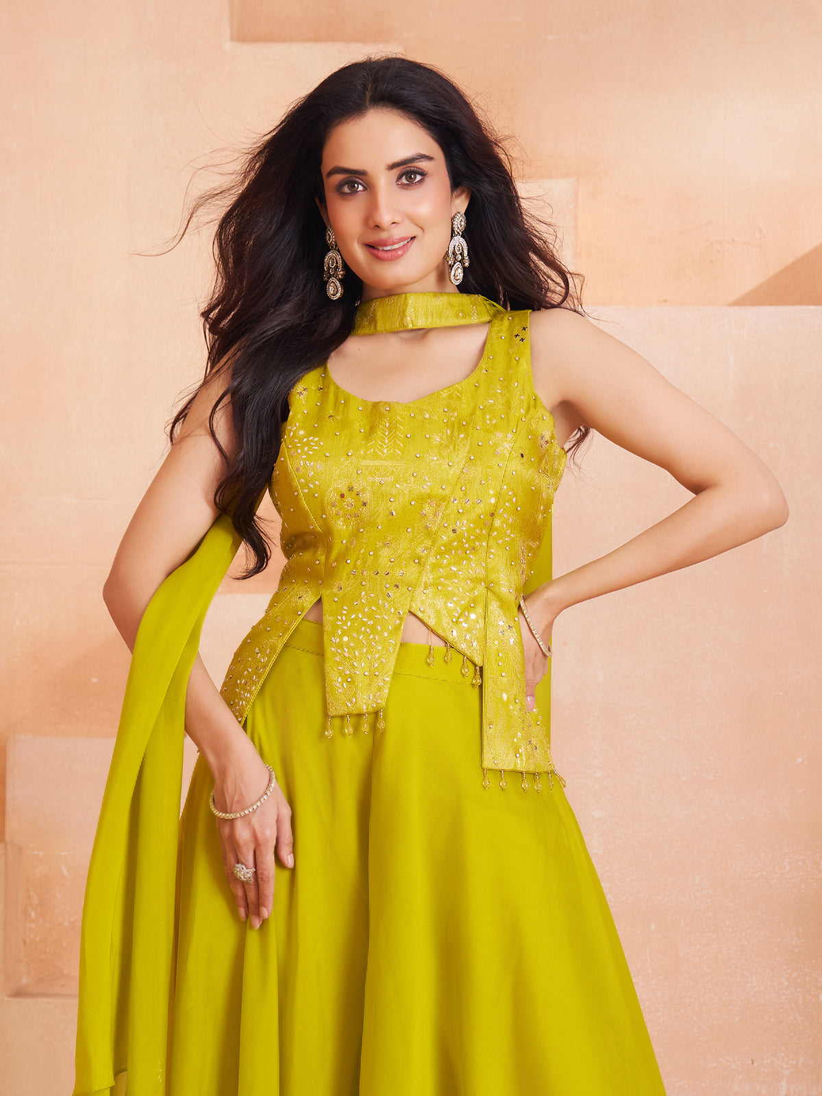 Light green silk palazzo suit with shimmering tassels