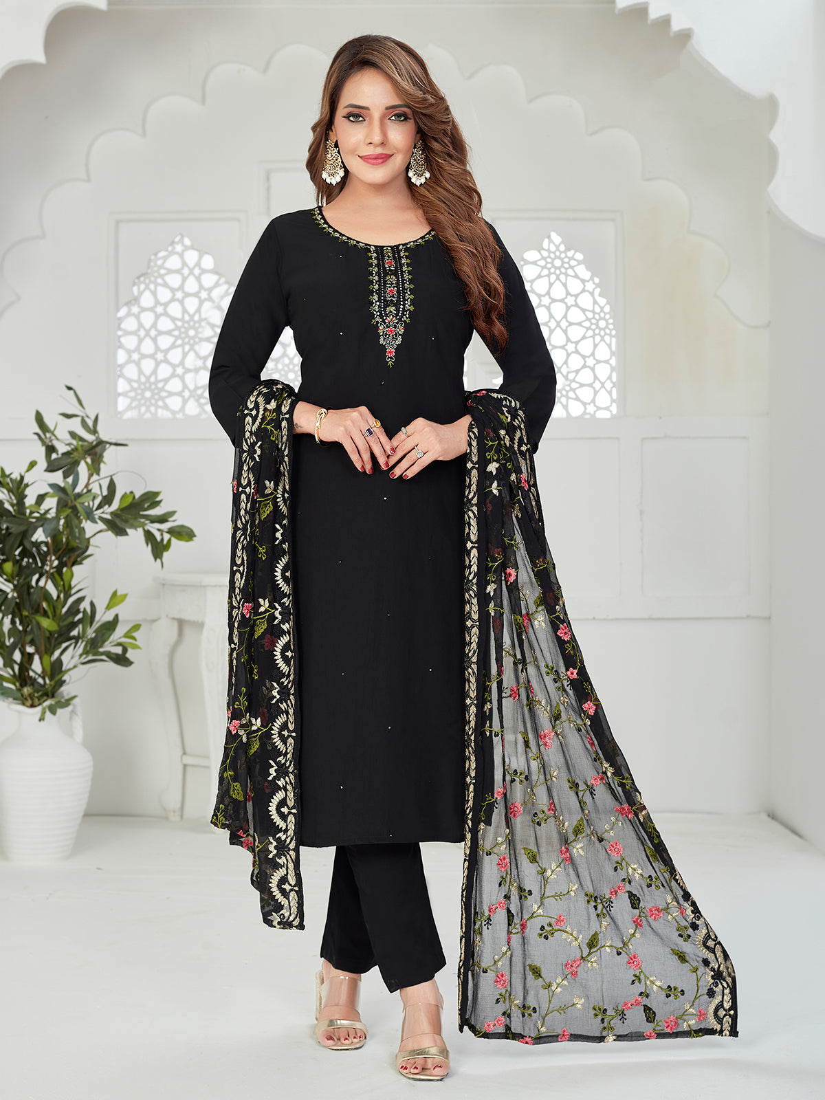 Black silk straight suit with rich zardosi artistry