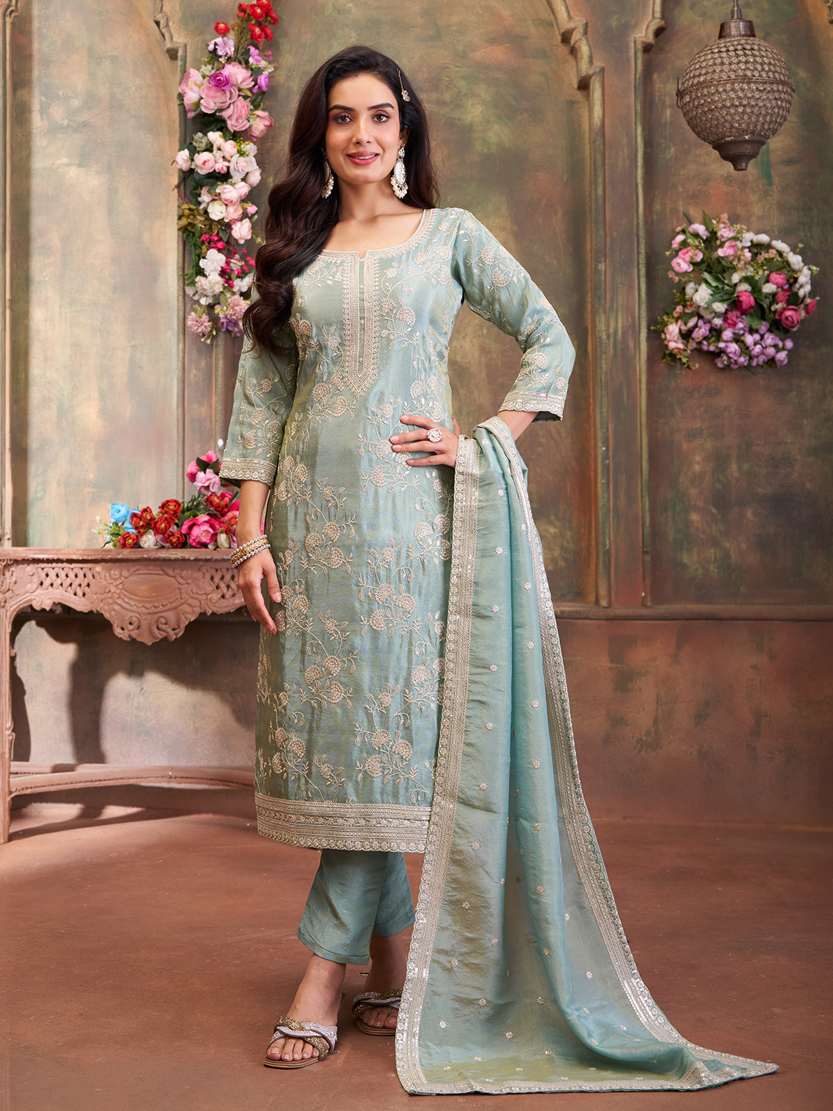 Mint green silk straight suit with graceful detailing