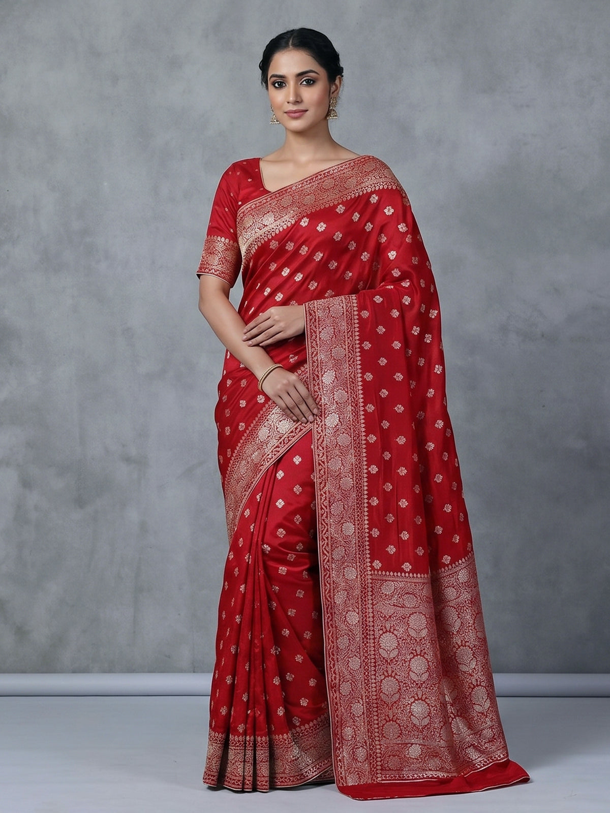 Red dola silk saree with stone zari butti work