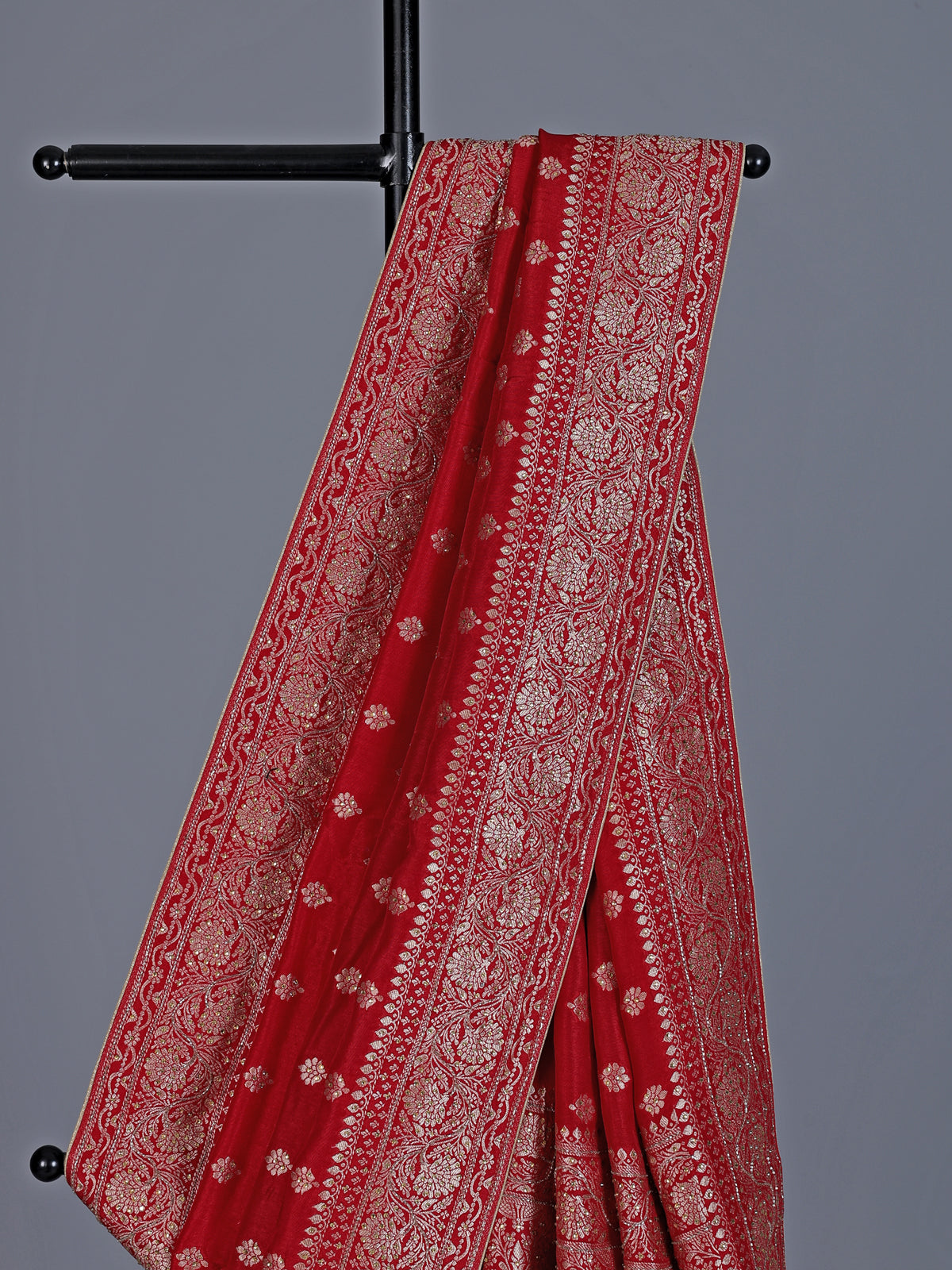 Red dola silk saree with stone zari butti work