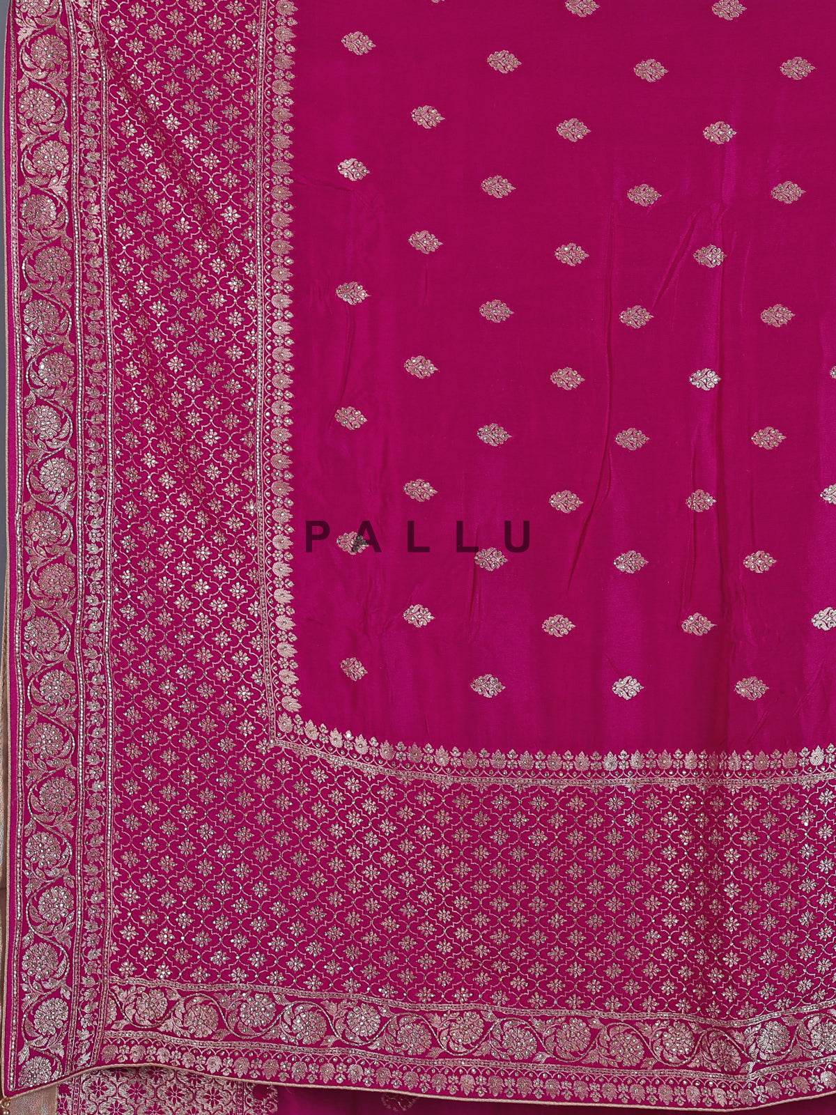 Rani pink dola silk saree with festive zari butti
