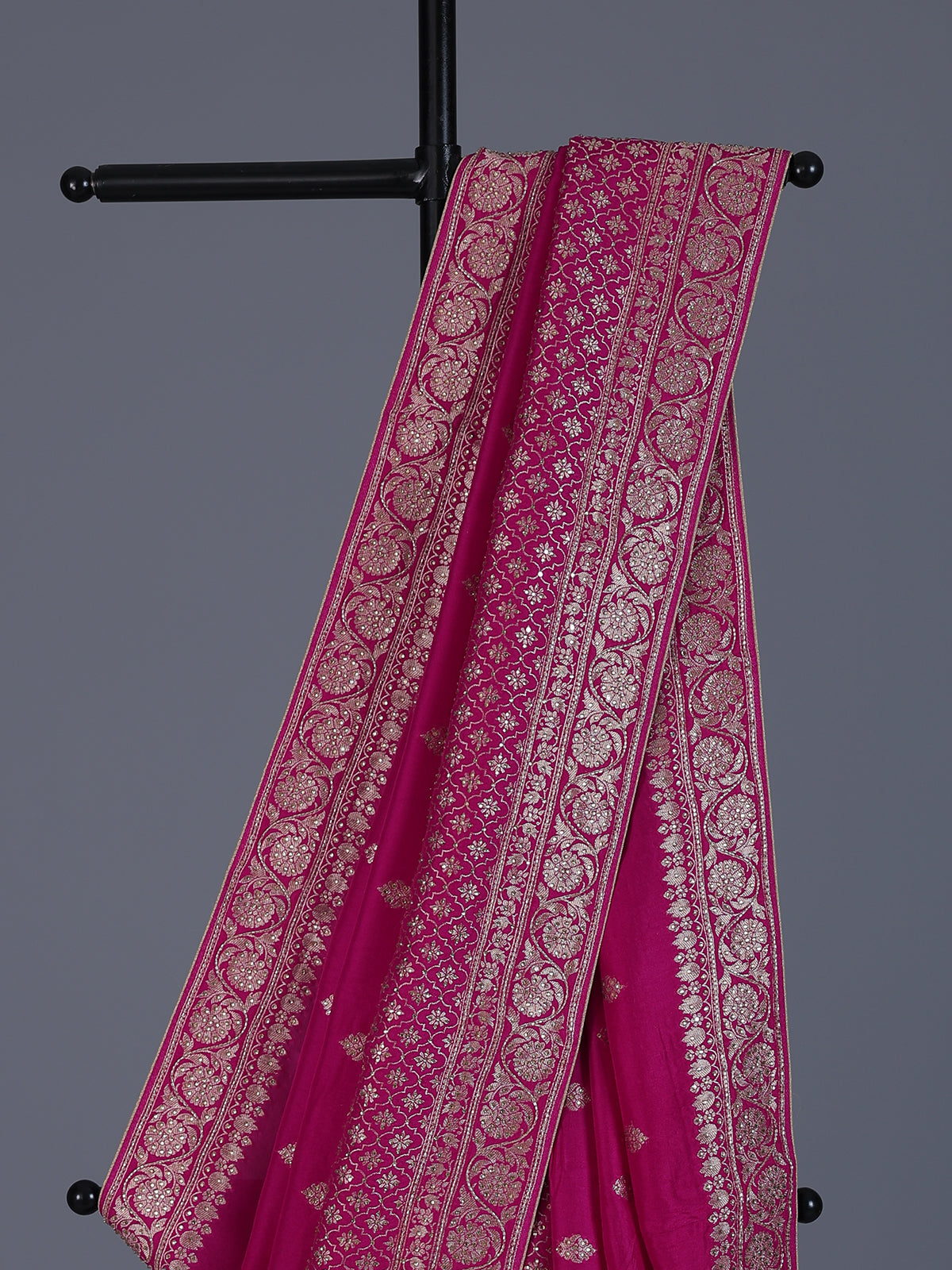Rani pink dola silk saree with festive zari butti