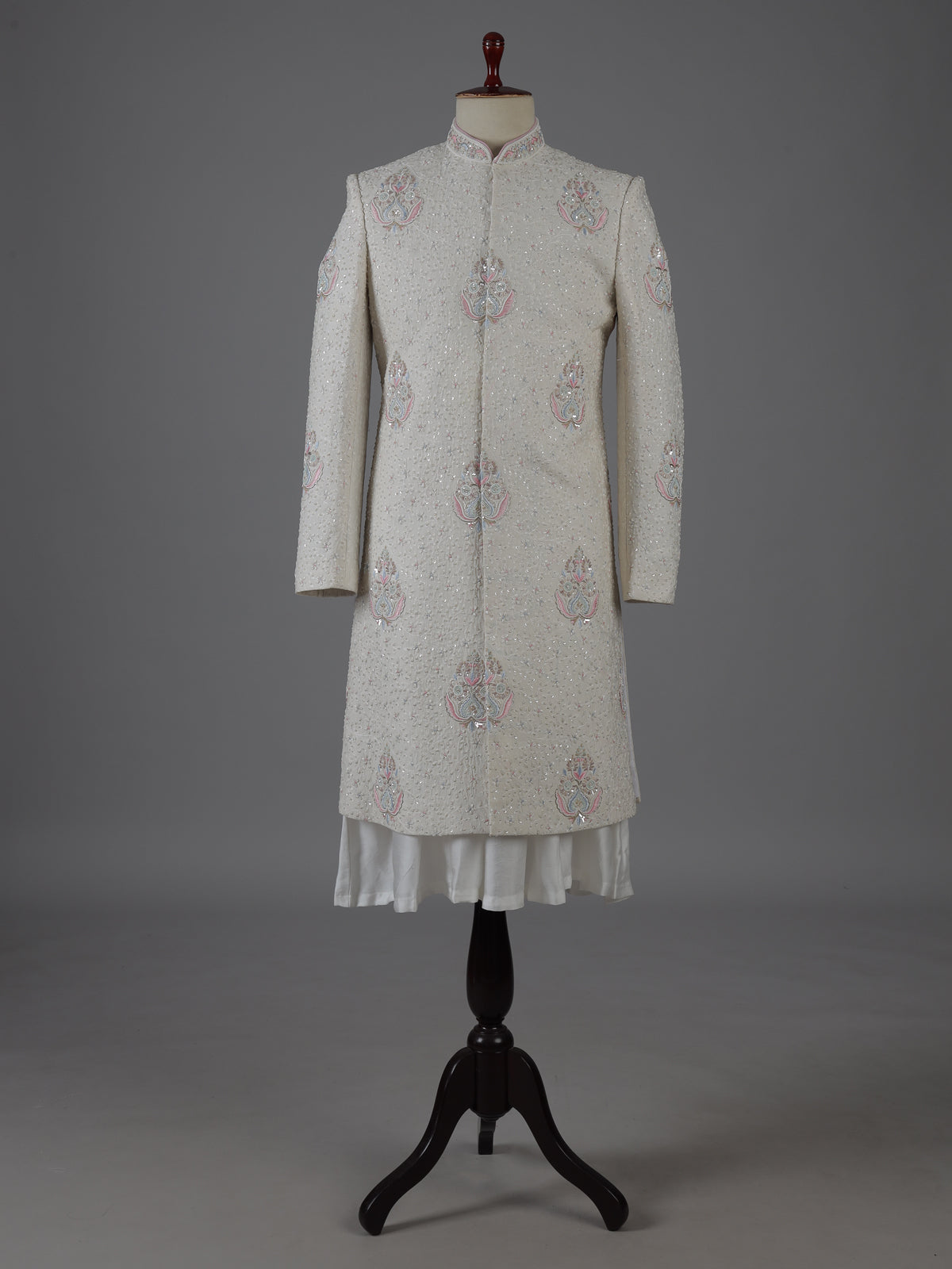 Cream cotton silk embroidered sherwani with regal detailing