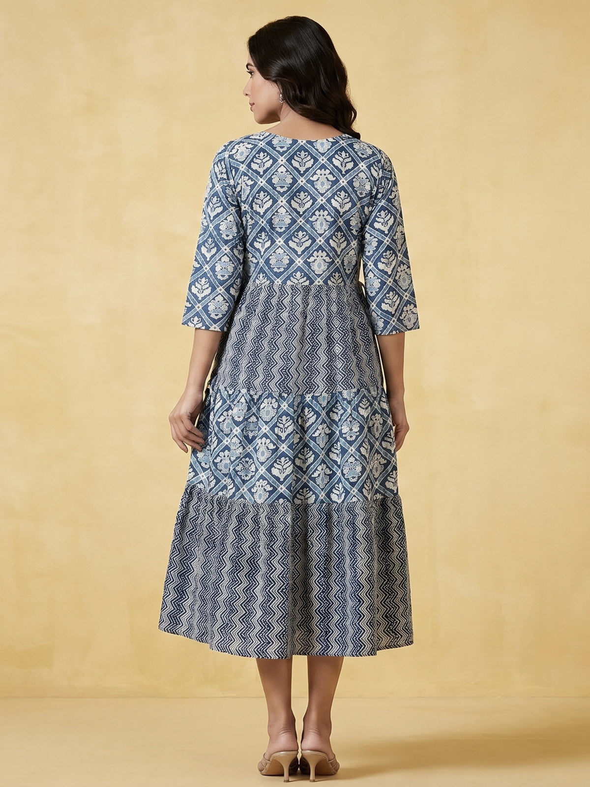 Blue printed cotton kurti designed with worked yoke pattern