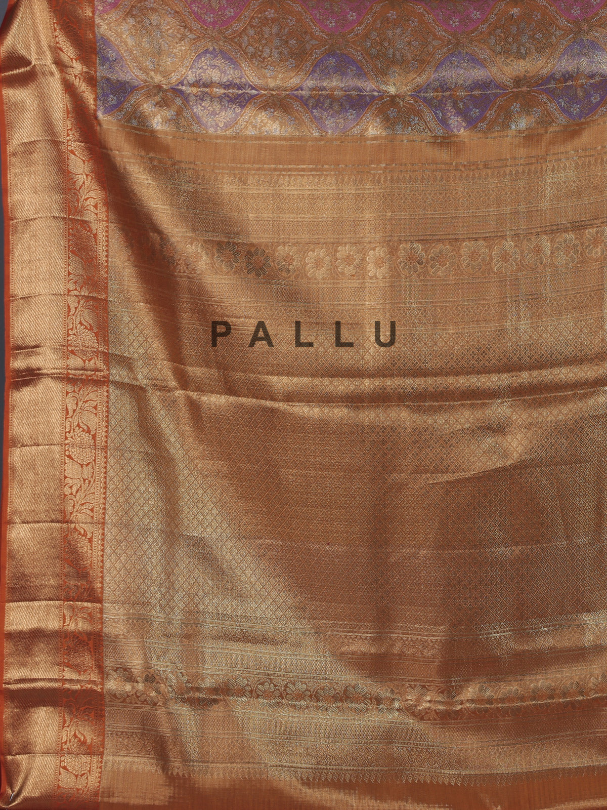 Golden Kanjivaram silk saree for weddings with ethnic motifs