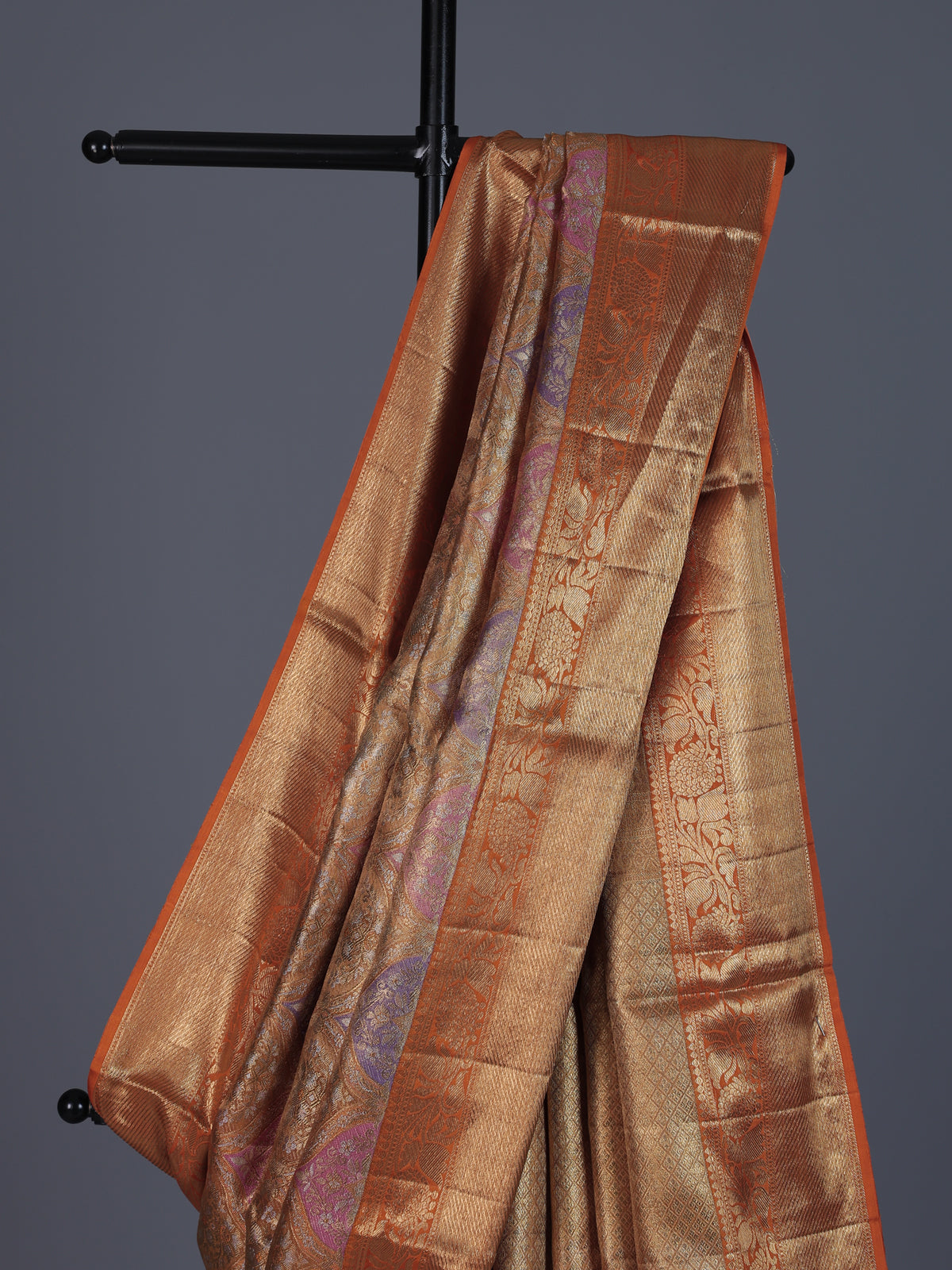 Golden Kanjivaram silk saree for weddings with ethnic motifs