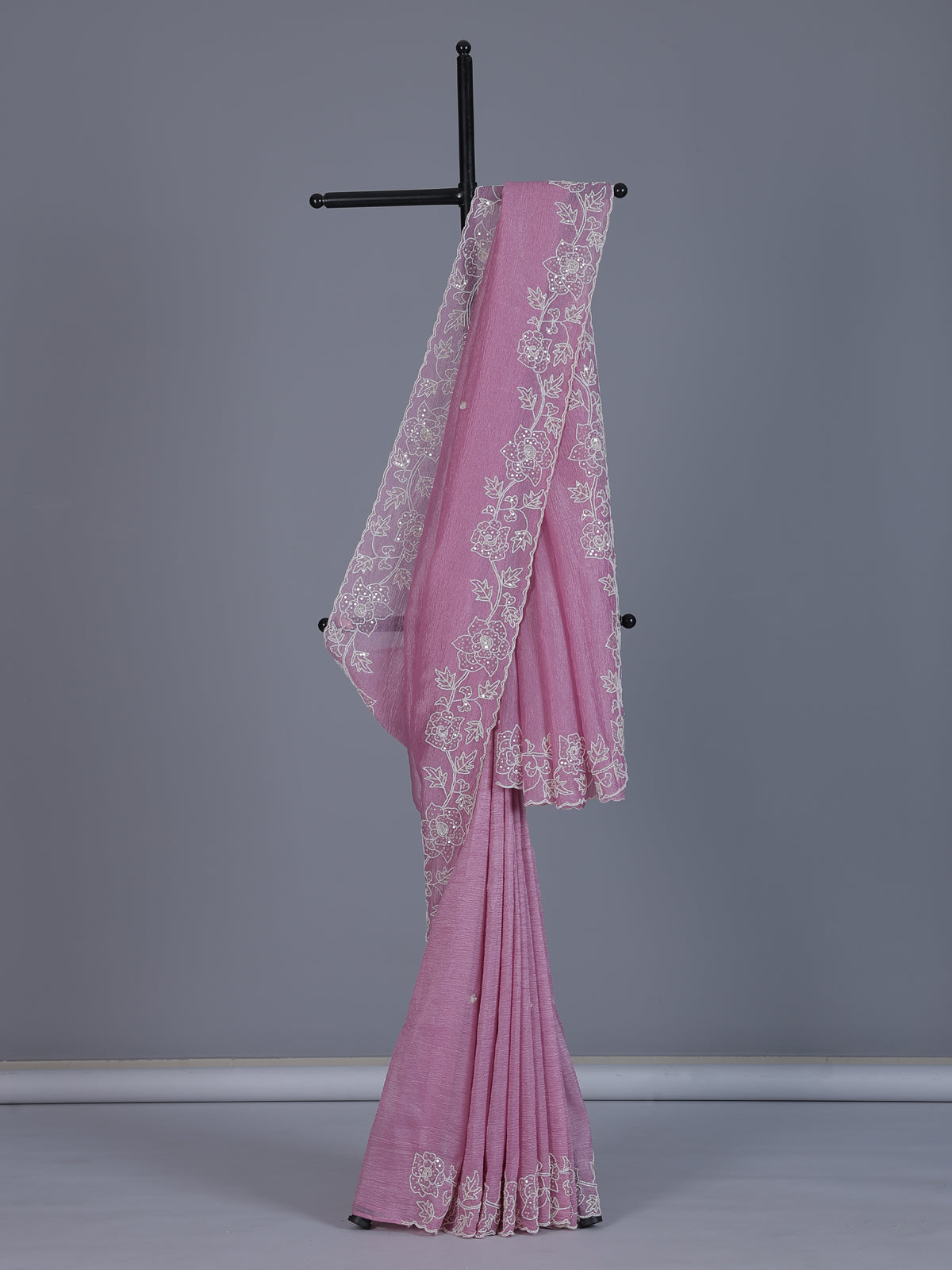 Pink crushed tissue saree with elegant festive sequins detailing