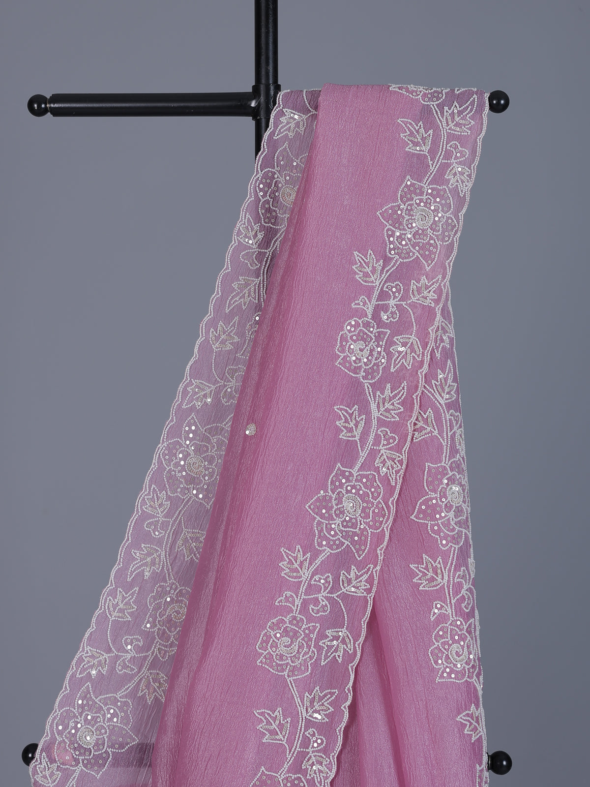 Pink crushed tissue saree with elegant festive sequins detailing