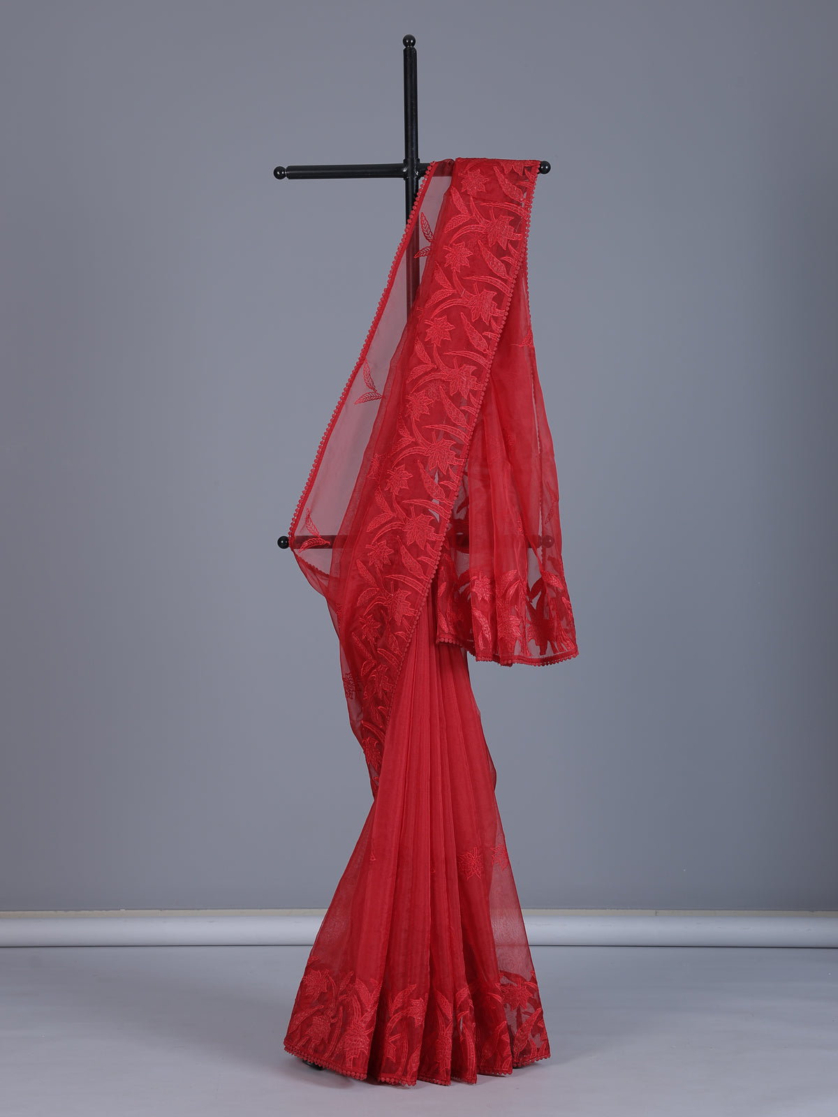 Red organza tissue saree with elegant embroidered party wear look