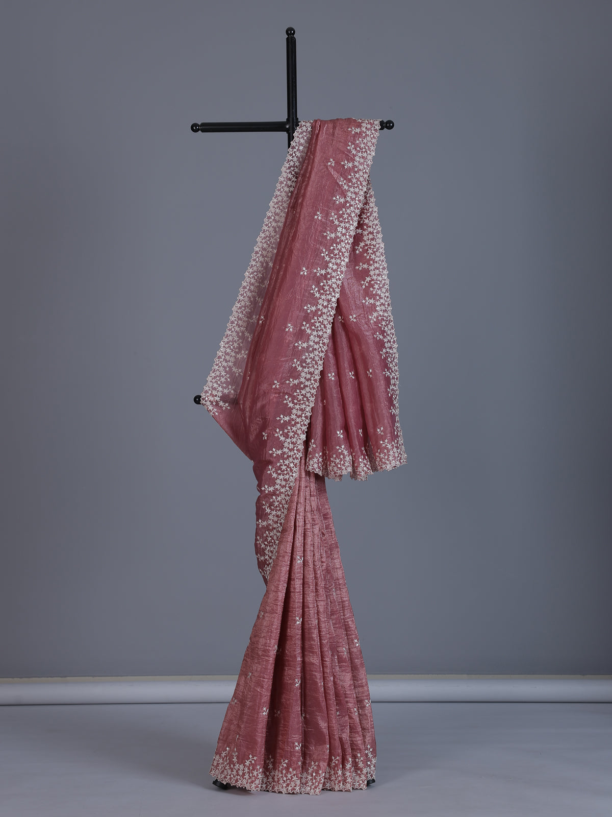 Onion pink tissue silk saree with shimmering festive elegance
