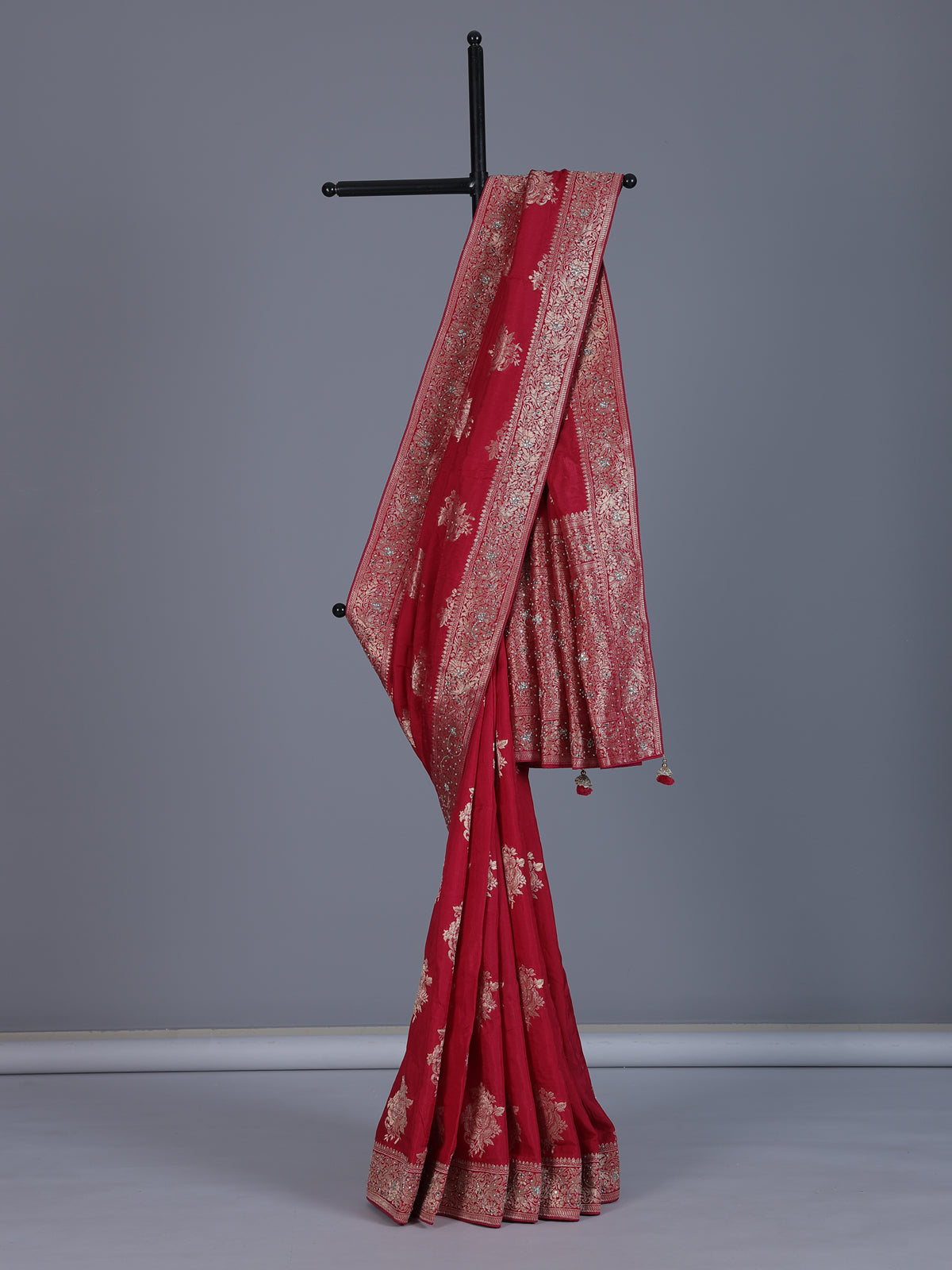 Red silk saree with zari stone and cutdana work
