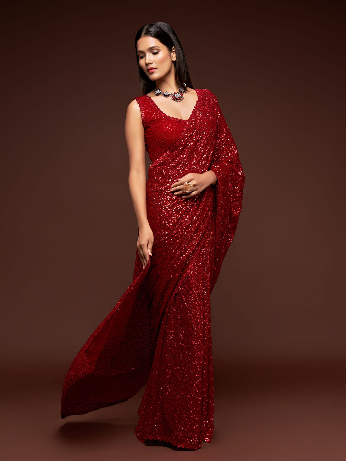 Luxurious ruby red embellished festive saree