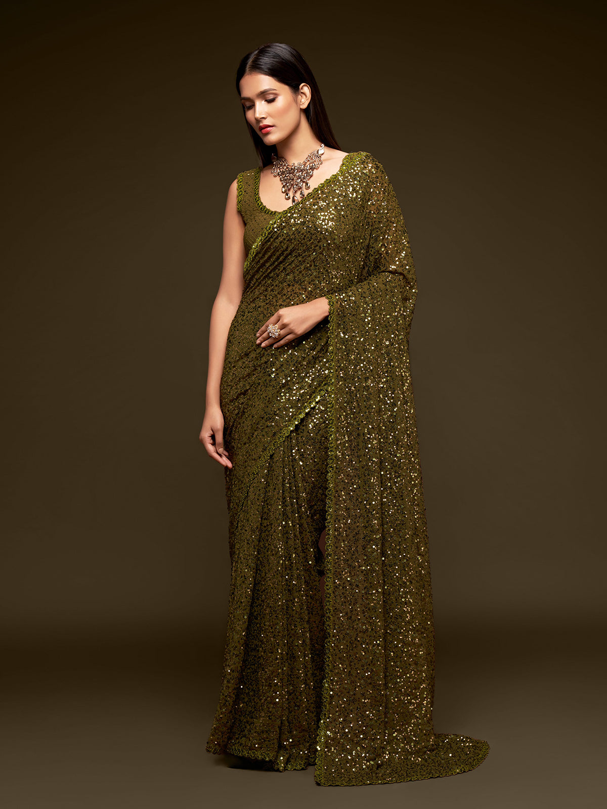Opulent olive green partywear drape saree