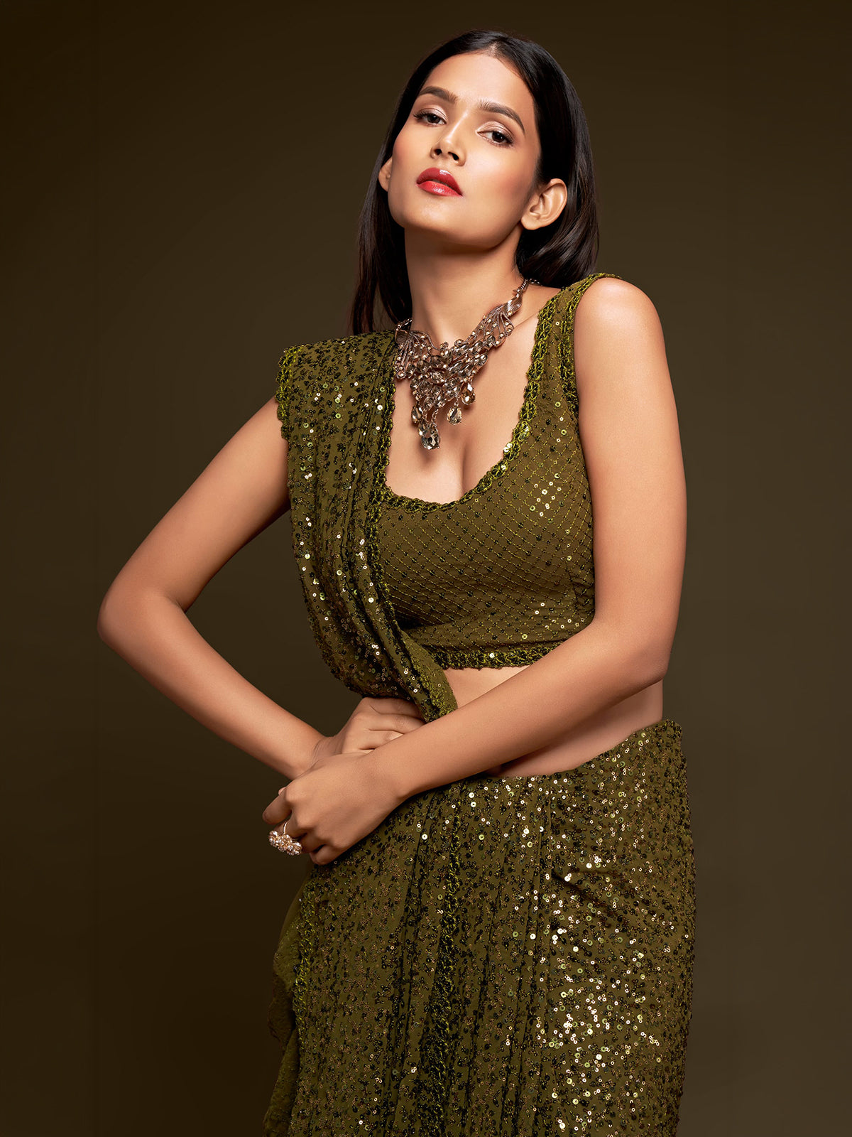 Opulent olive green partywear drape saree