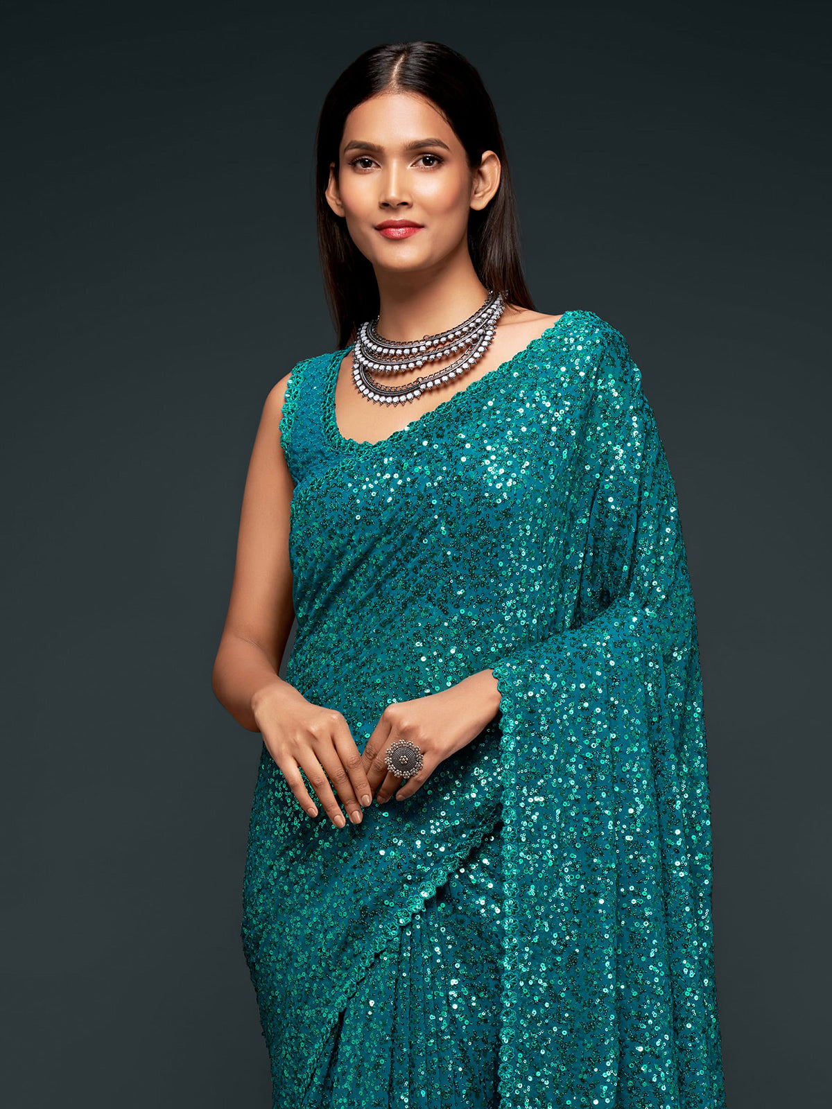 Elegant teal blue embellished party saree