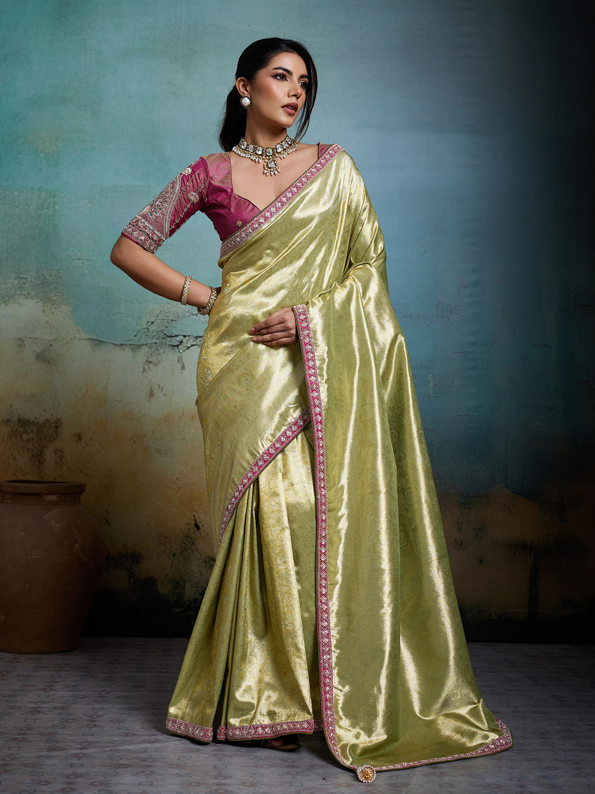Elegant green metallic tissue silk saree