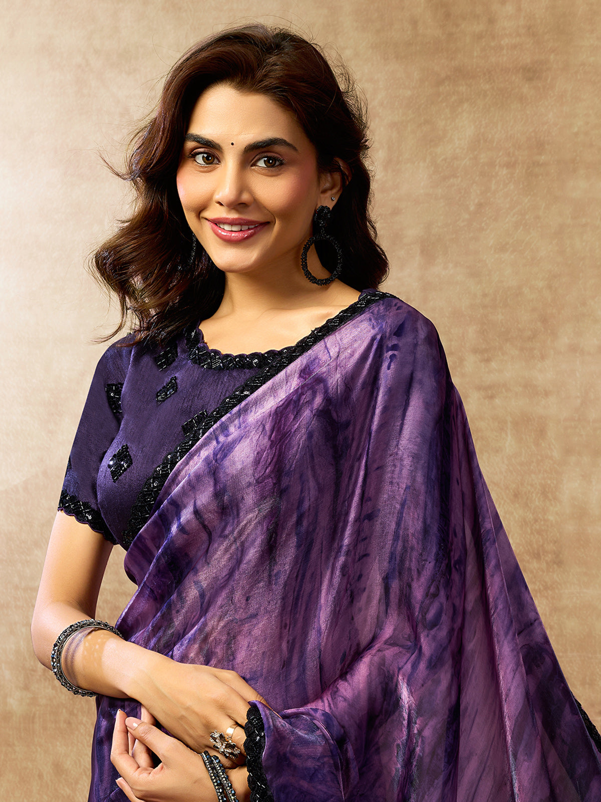 Sophisticated purple abstract satin saree