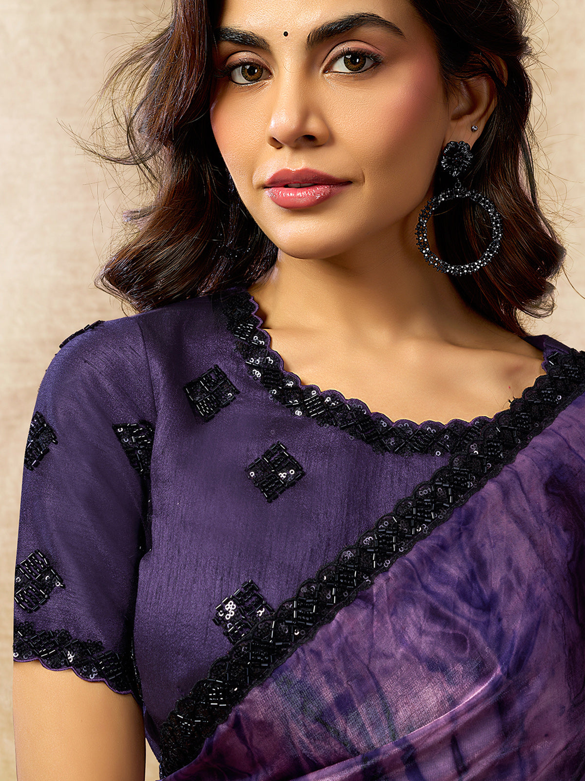 Sophisticated purple abstract satin saree