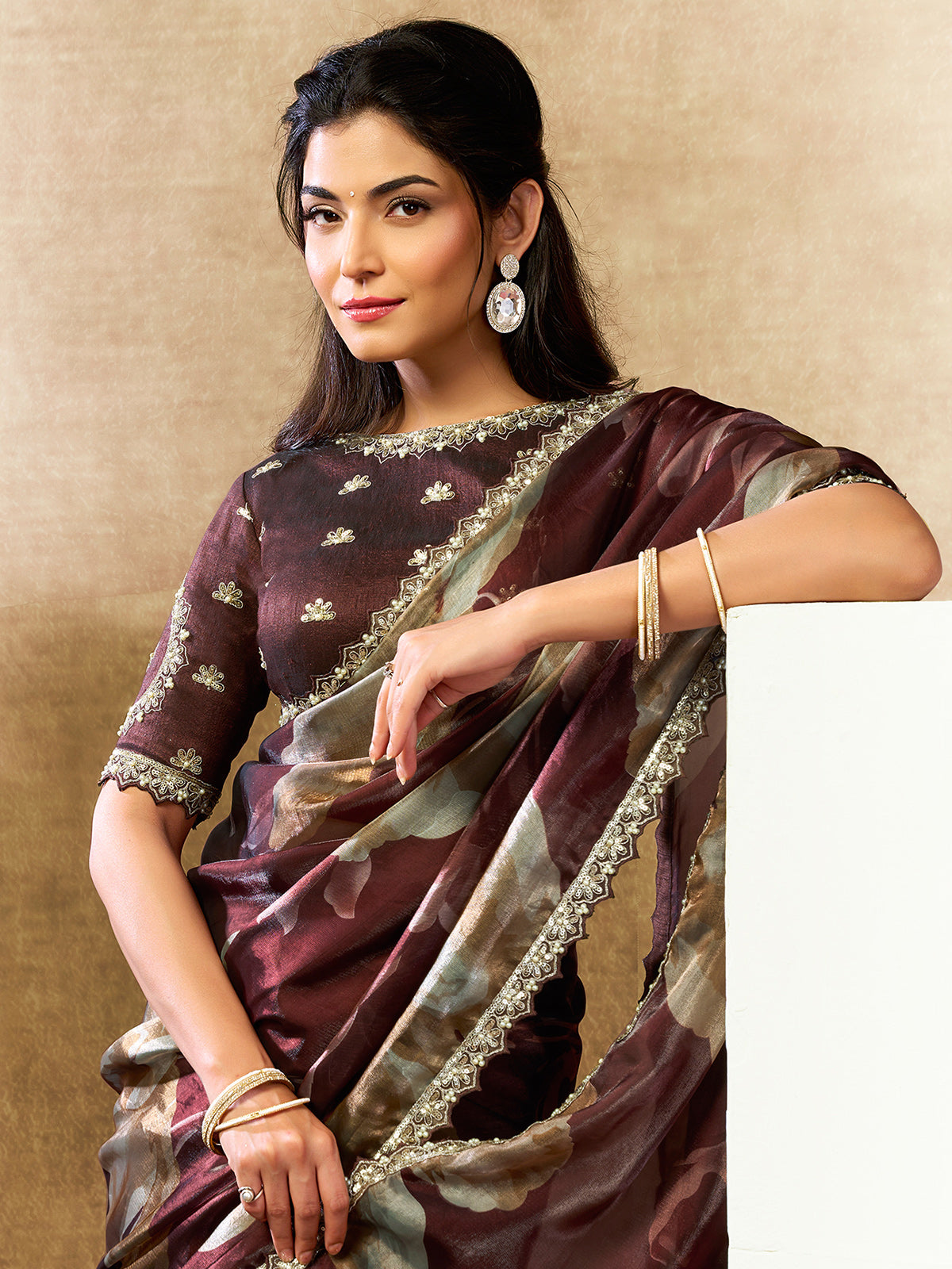 Graceful maroon floral festive saree