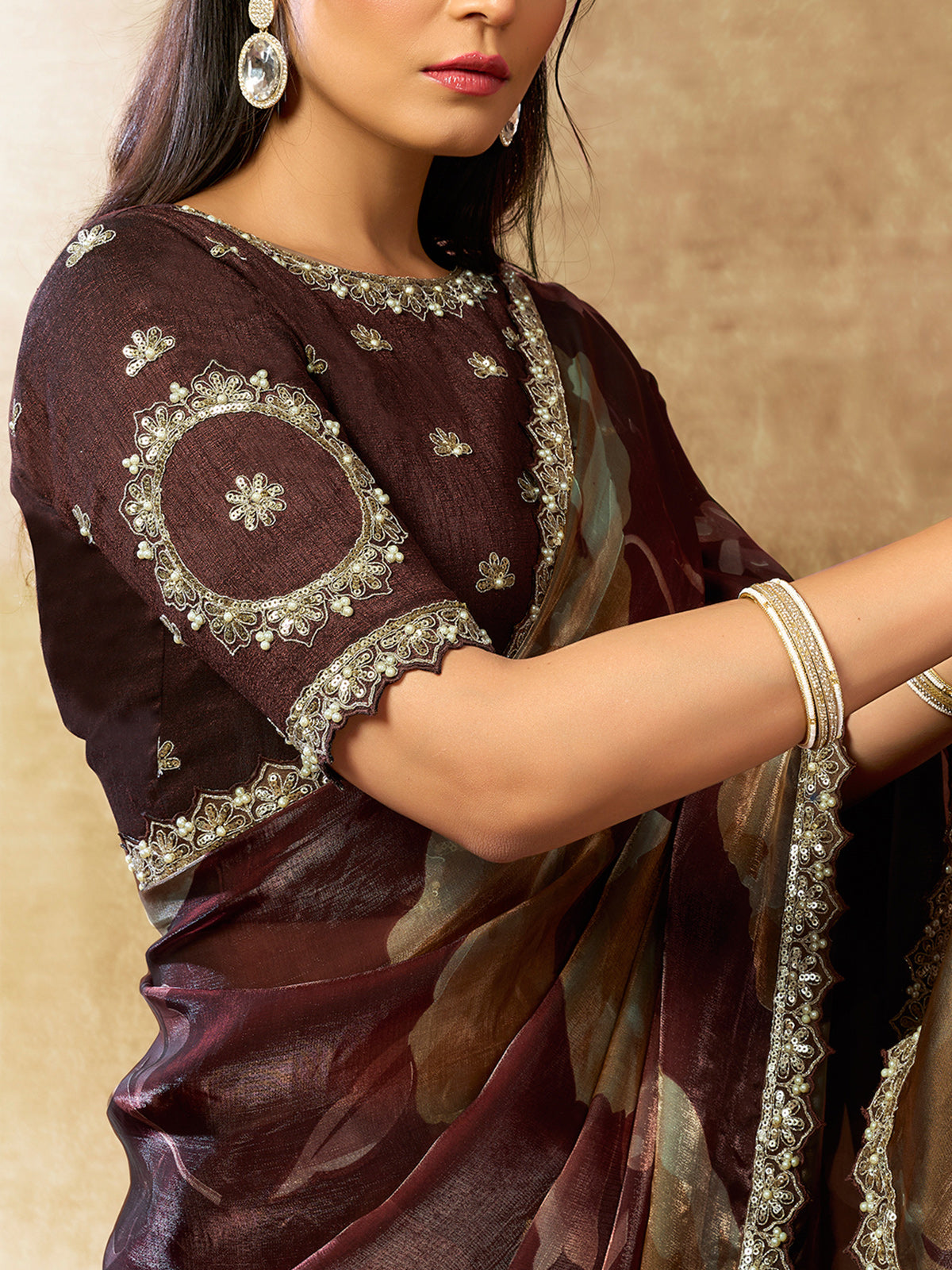 Graceful maroon floral festive saree