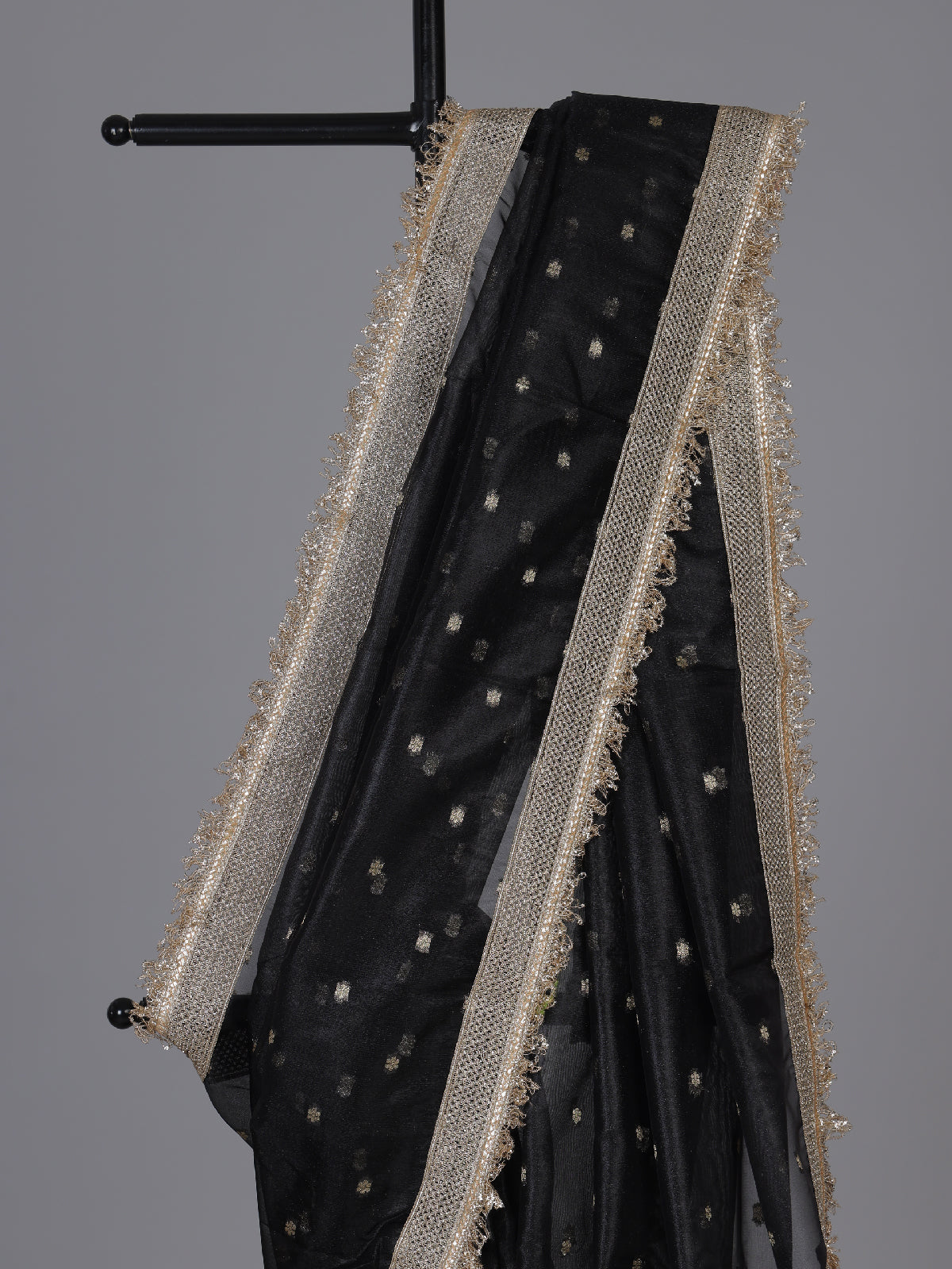 Black embellished semi soft tissue reception saree