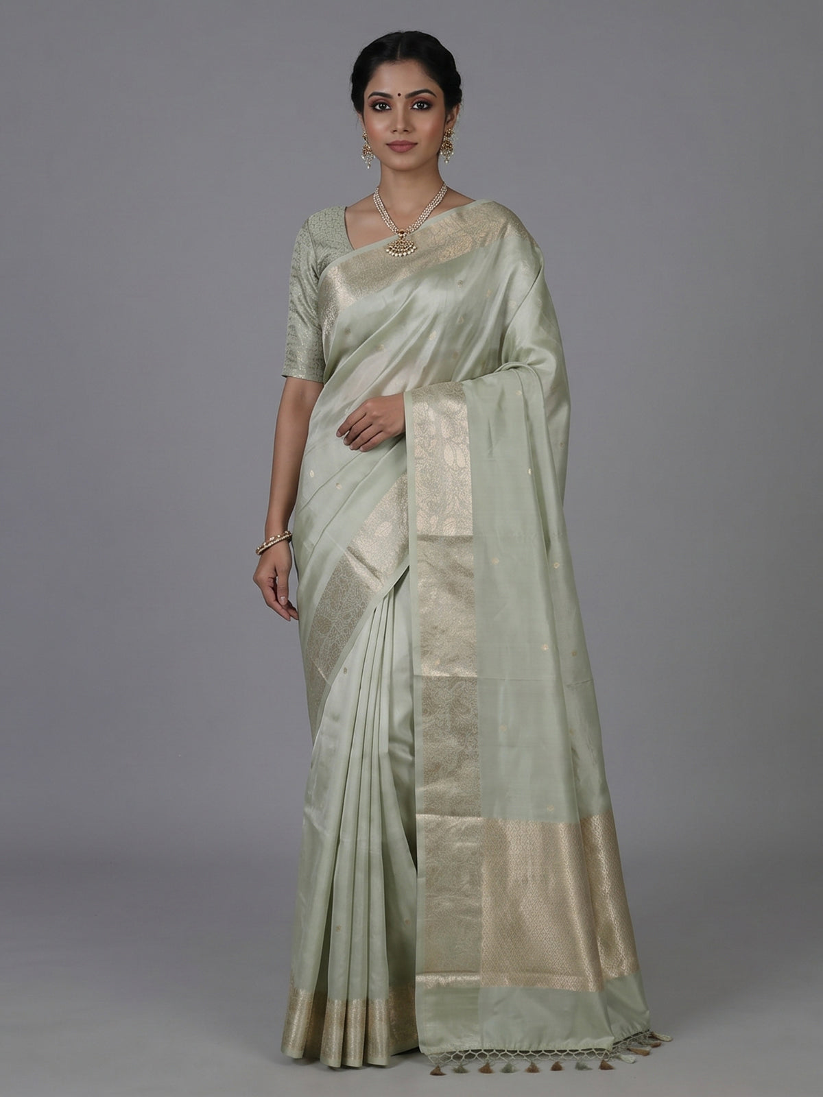 Pista green timeless raw silk zari celebration saree