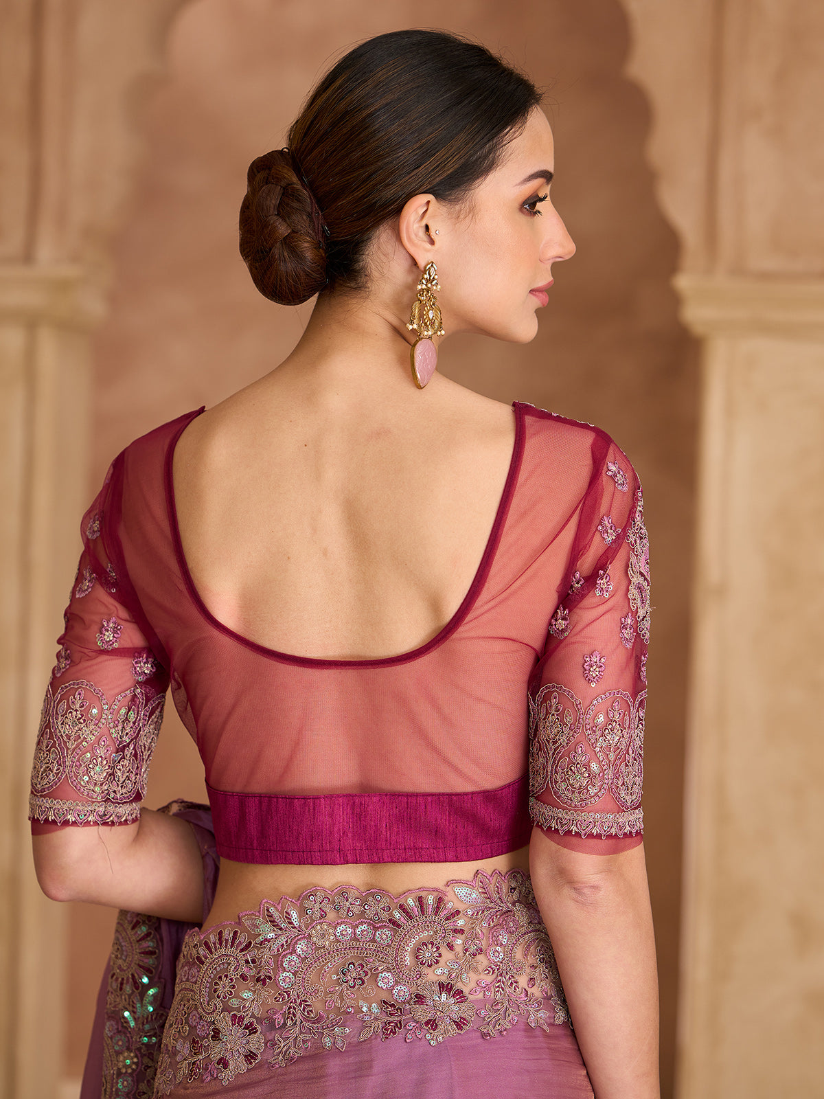 Onion pink luxurious embroidered festive saree statement