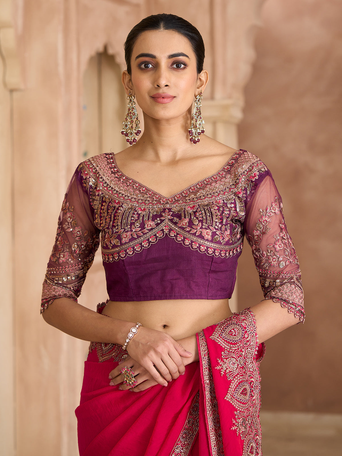 Cherry red luxurious zari wedding saree statement
