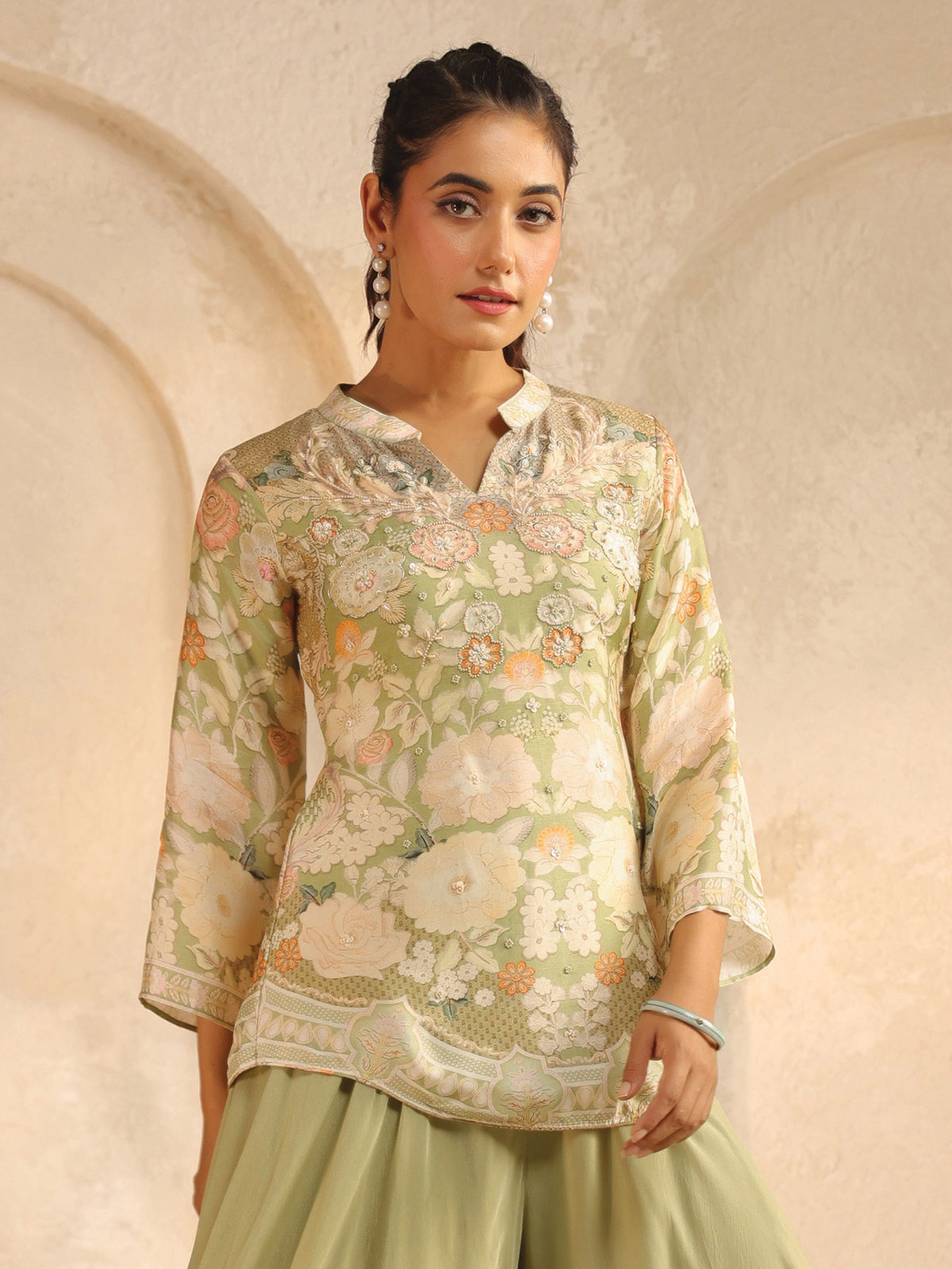 Pista green printed palazzo suit with bead work