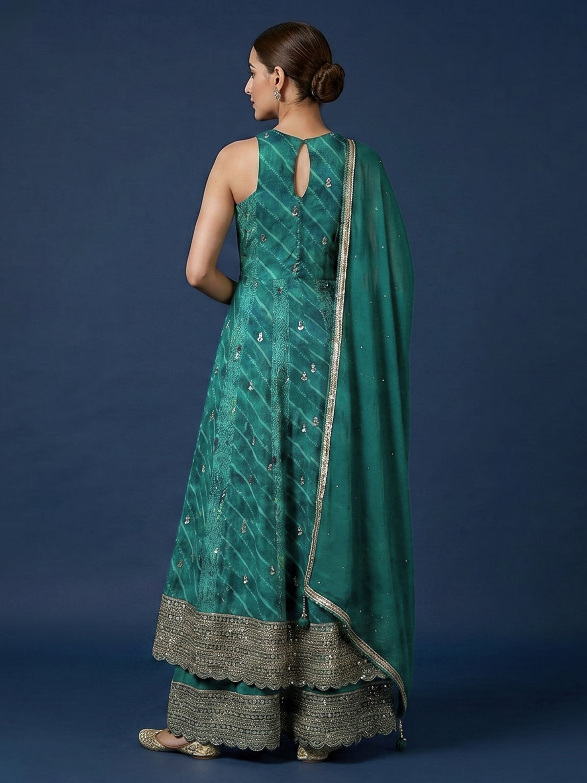 Green silk anarkali palazzo suit for wedding celebration