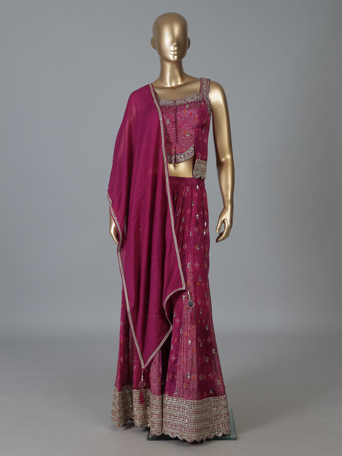 Purple silk palazzo suit with intricate detailing