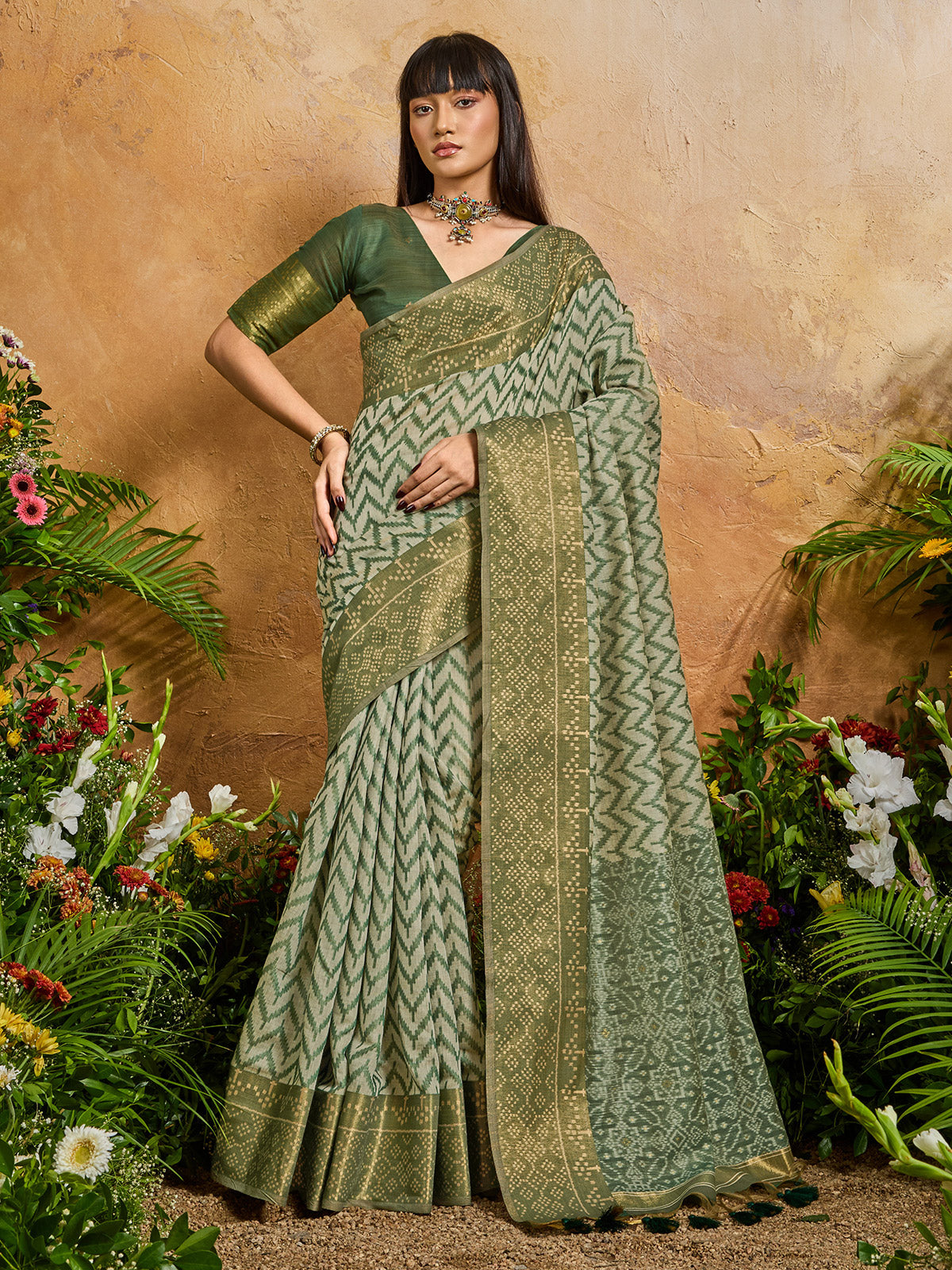 Green vibrant printed zari festive saree elegance
