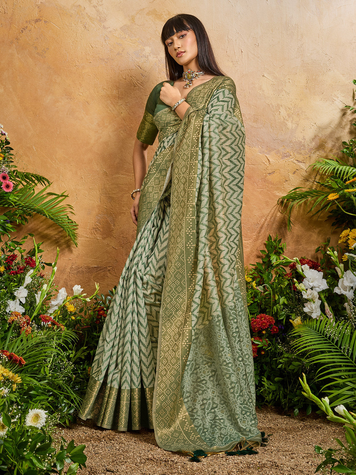 Green vibrant printed zari festive saree elegance
