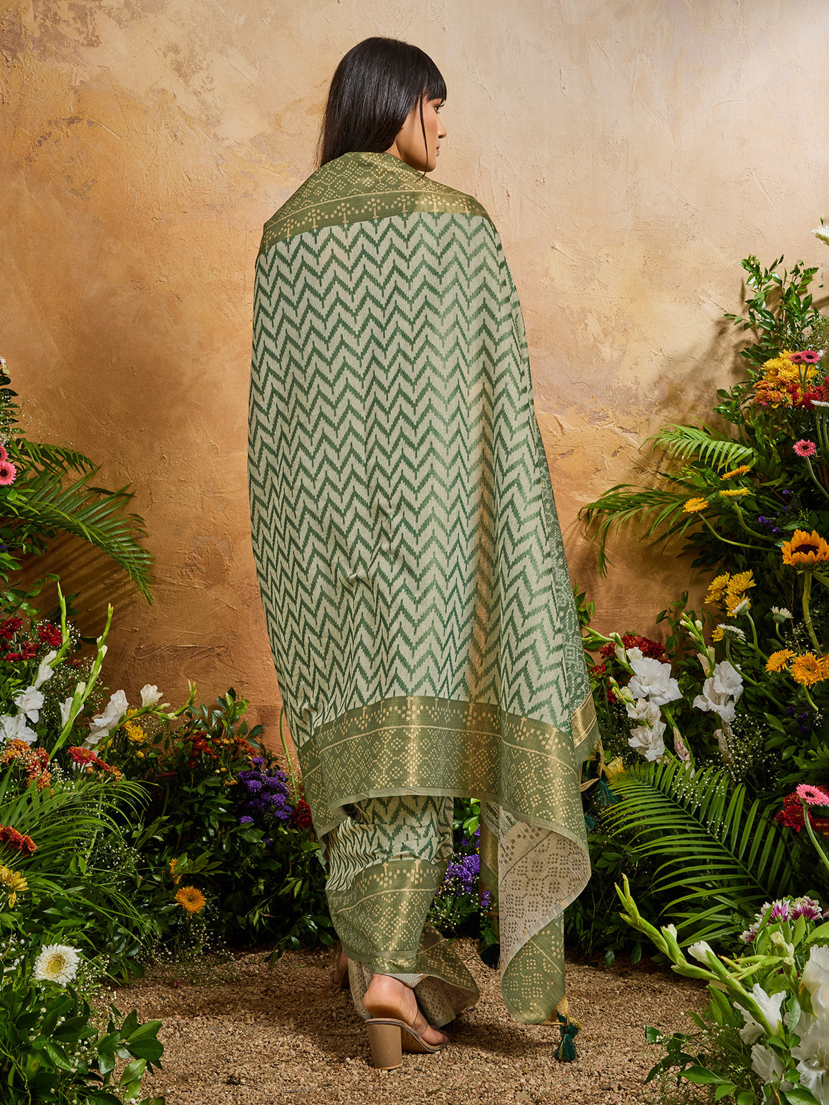 Green vibrant printed zari festive saree elegance