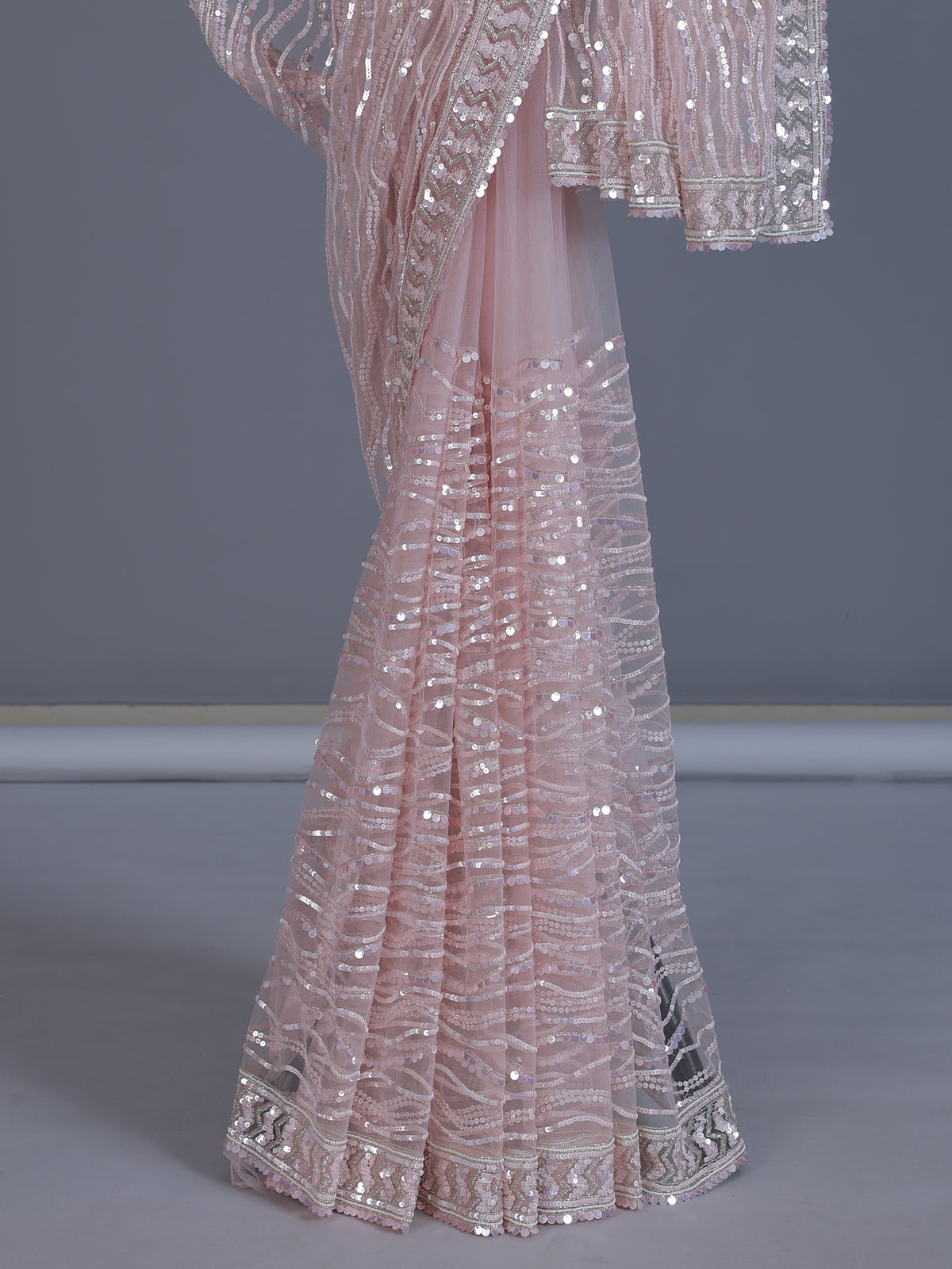 Baby pink party wear net saree with beads and cutdana work