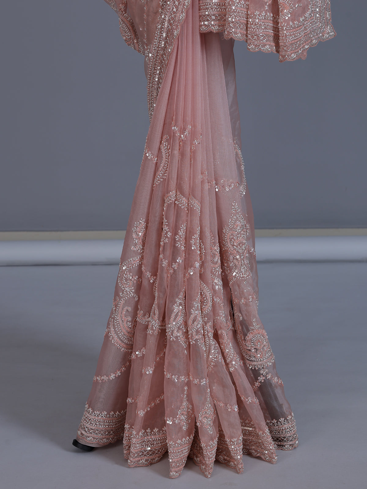 Peach tissue silk saree with beads and cutdana work